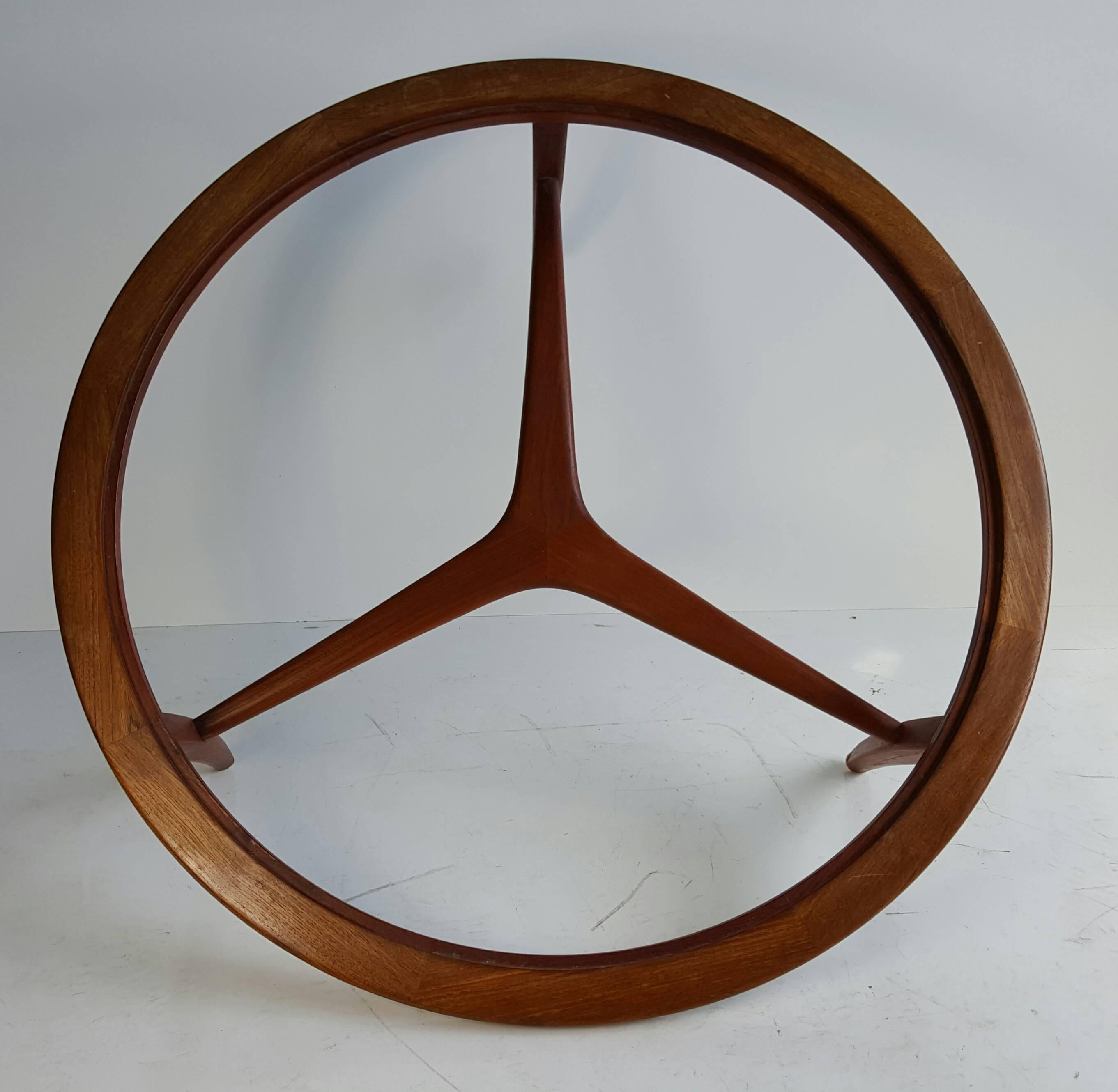Nice modernist cocktail table, solid teakwood construction, unusual strecher, Mercedes Benz logo design, quality construction and wood joinery, glass insert needed.