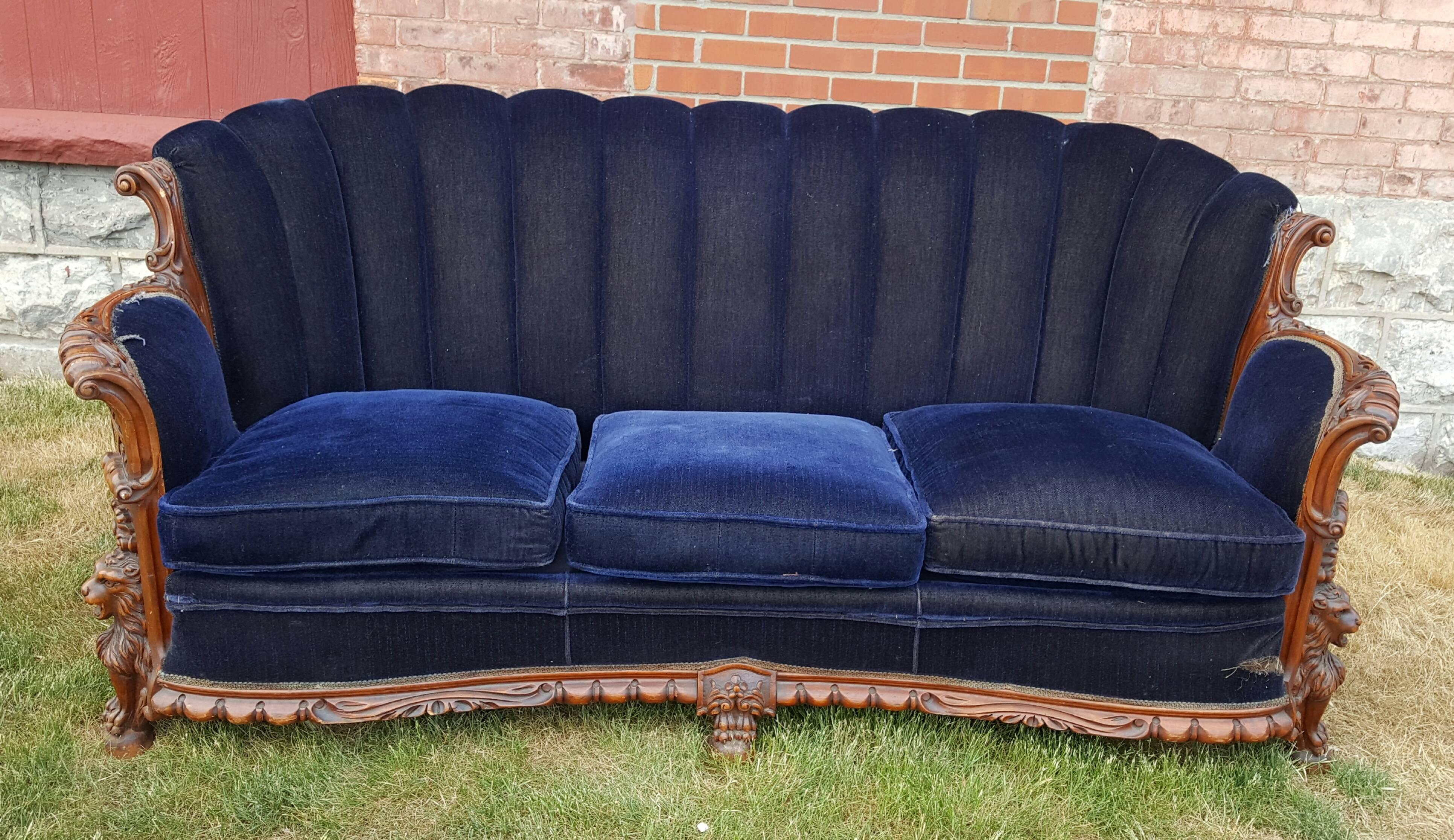 Wonderful high style Art Deco sofa, made in in 1930s, retain original blue and mohair fabric upholstery, in need of repair, heavily carved mahogany wood frames, amazing carved lions motif along with gorgeous carved wood details, superior quality and