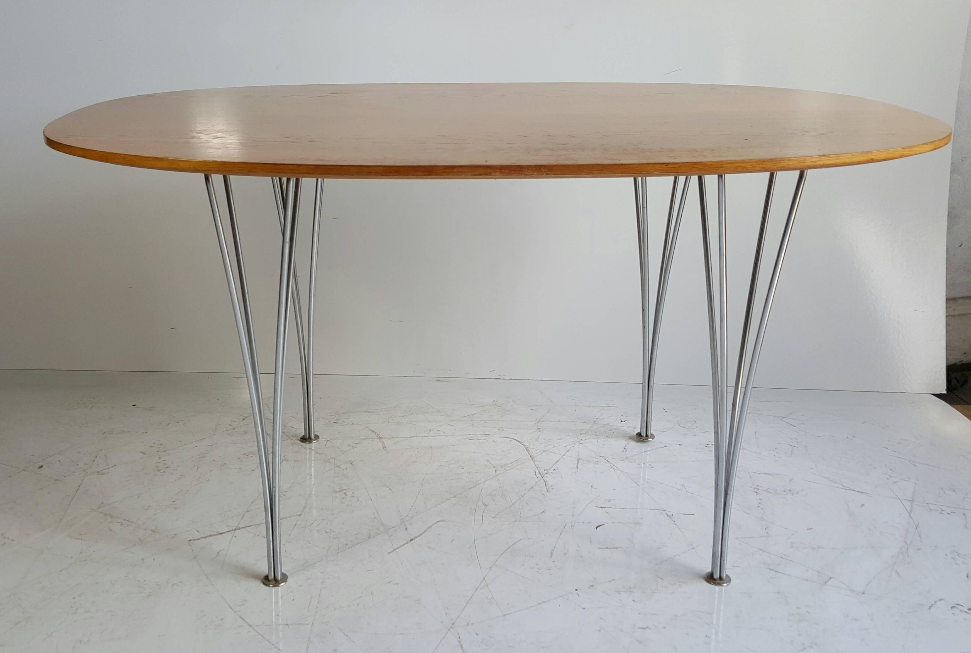 Rare and early dining table designed by Piet Hein, Bruno Mathsson and Arne Jacobsen, beautiful beechwood top, stainless steel legs, retains early Fritz Hansen label as well as 