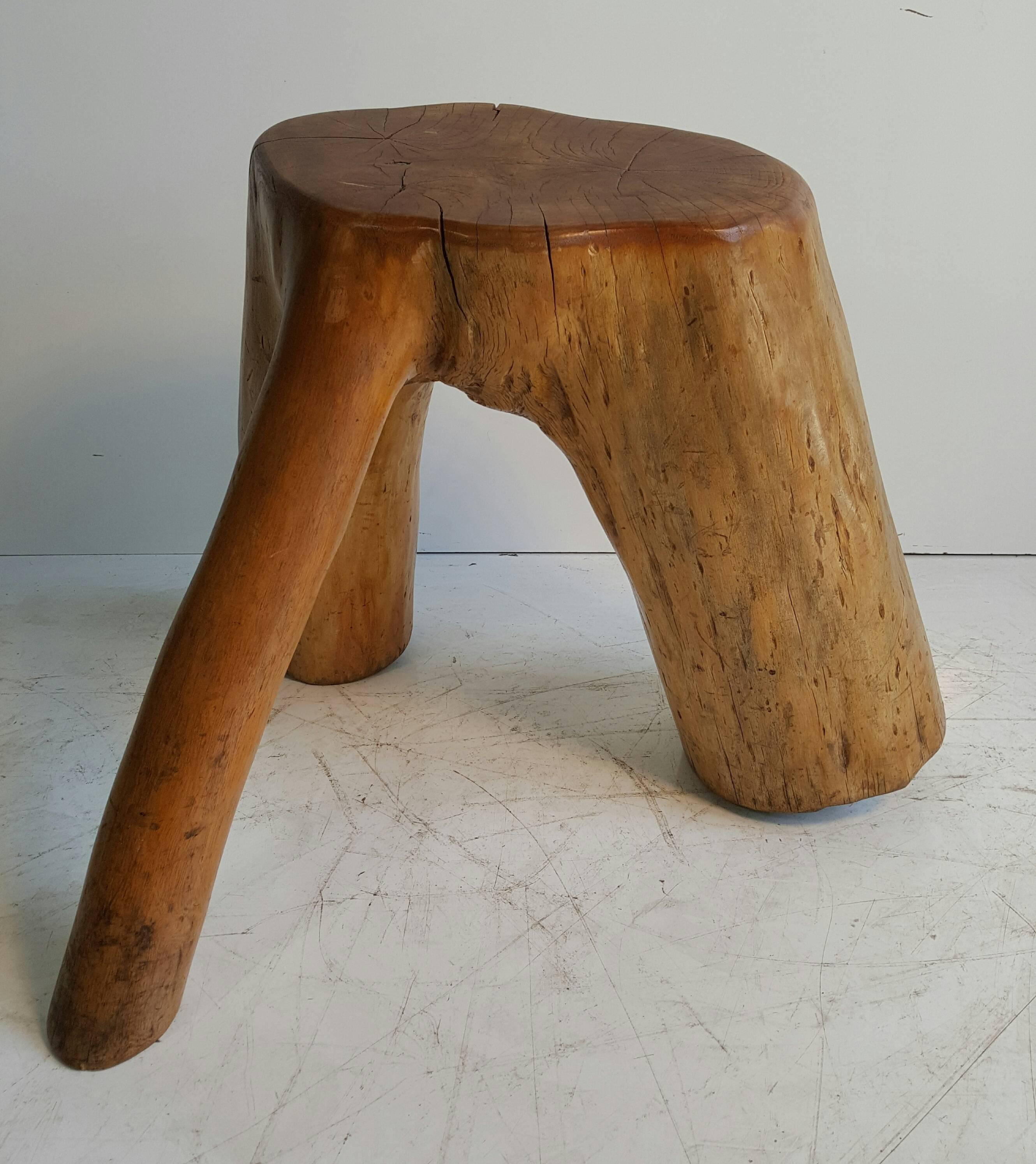 Organic free-form solid burl wood stool /stump. Nice simple modernist design, retains original turquoise stone detail embedded into top.