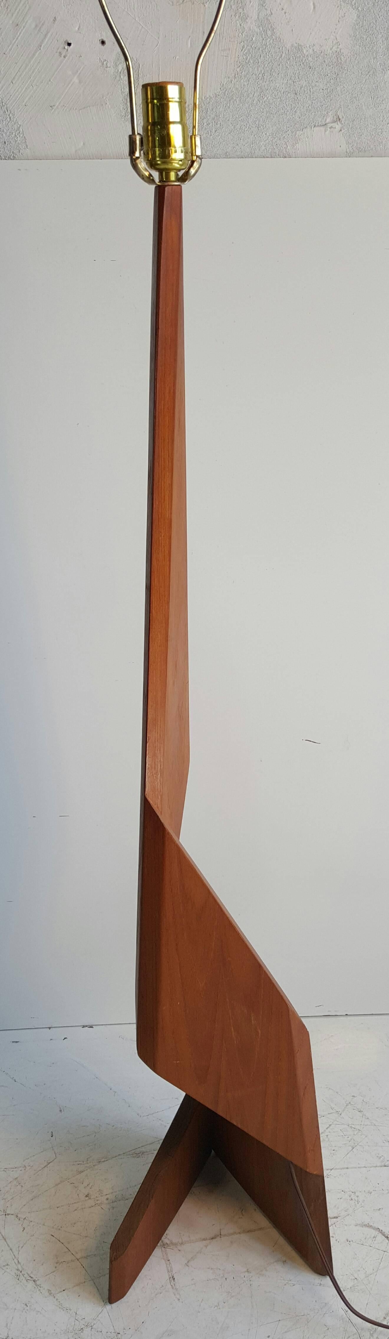 Danish modern floor lamp. Solid teak construction. Beveled, architecturally stacked. Retains original shade, minor water staining to shade.