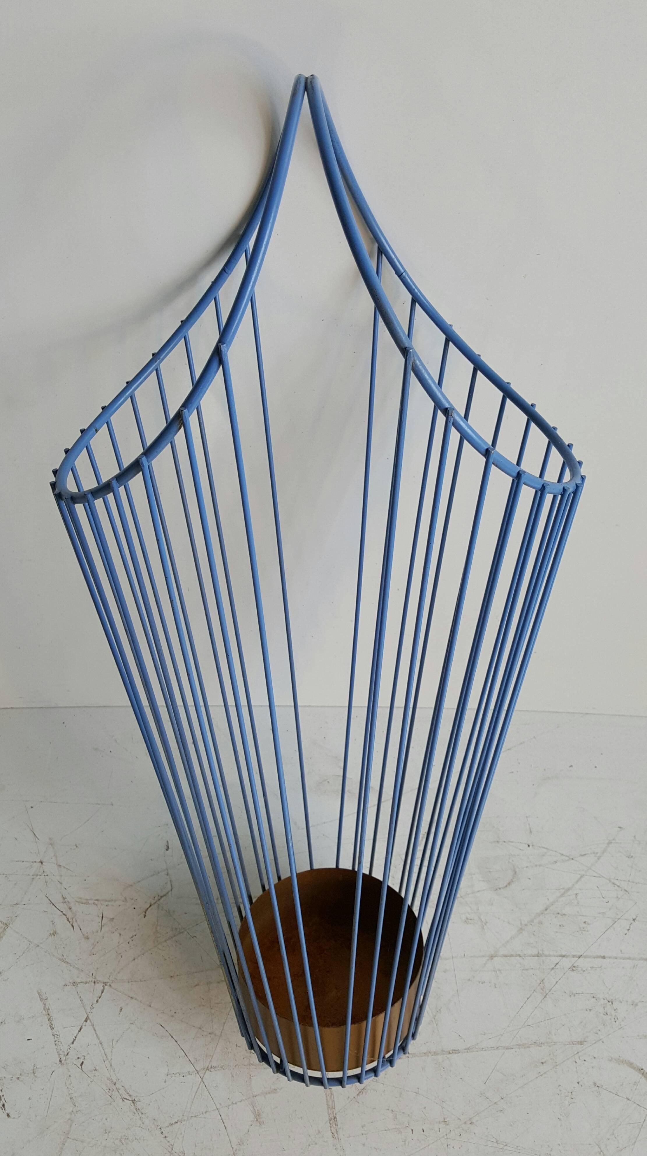 Charming modernist wire iron umbrella stand, painted periwinkle blue, great little object. Utilitarian sculpture. Retains original copper/brass insert in the manner of Mathieu Matégot.