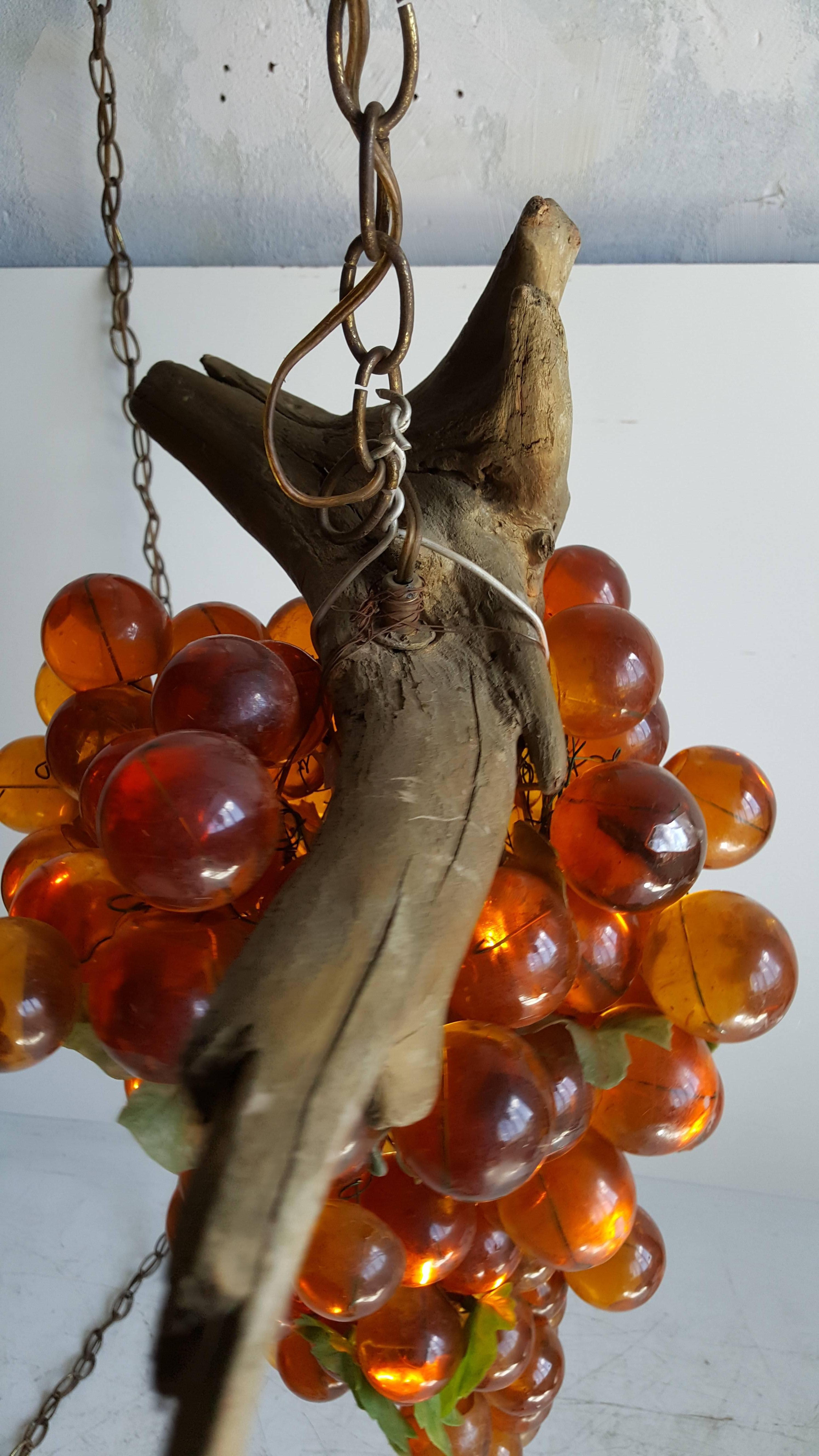 lucite grapes on driftwood