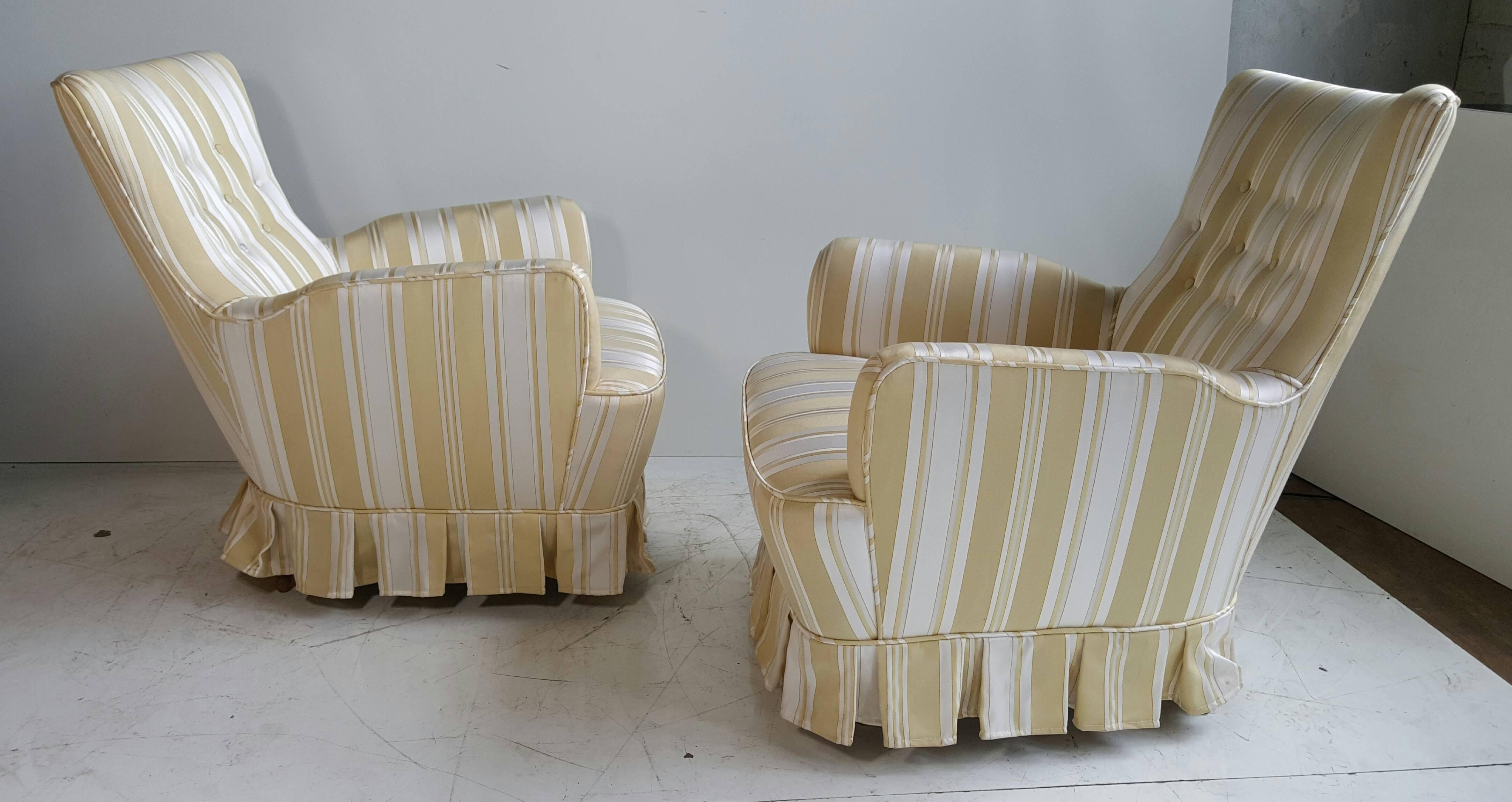 Stunning pair of modernist traditional Italian Boudoir chairs. Silk attributed to Paolo Buffa unusual slop down arm detail. Recently reupholstered in a wonderful silk fabric. Classic conical leg under traditional skirt, diminutive scale and