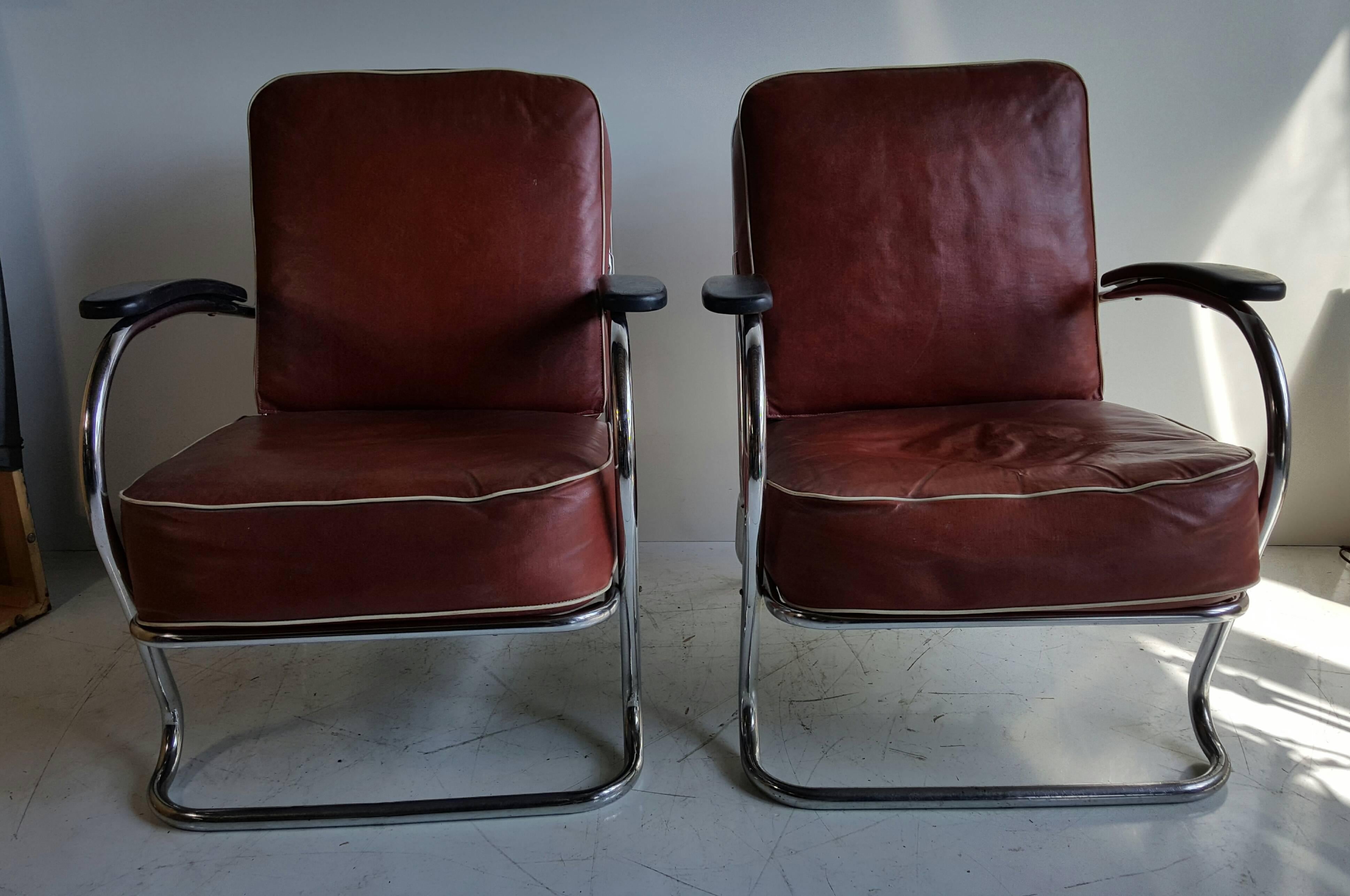 Pair of Art Deco tubular chrome lounge chairs designed by K E M Weber for Lloyd Manufacturing Co., Classic streamline design. Extremely comfortable, retains original Lloyd labels as well as oil cloth cushions, remarkably. Still in nice condition.