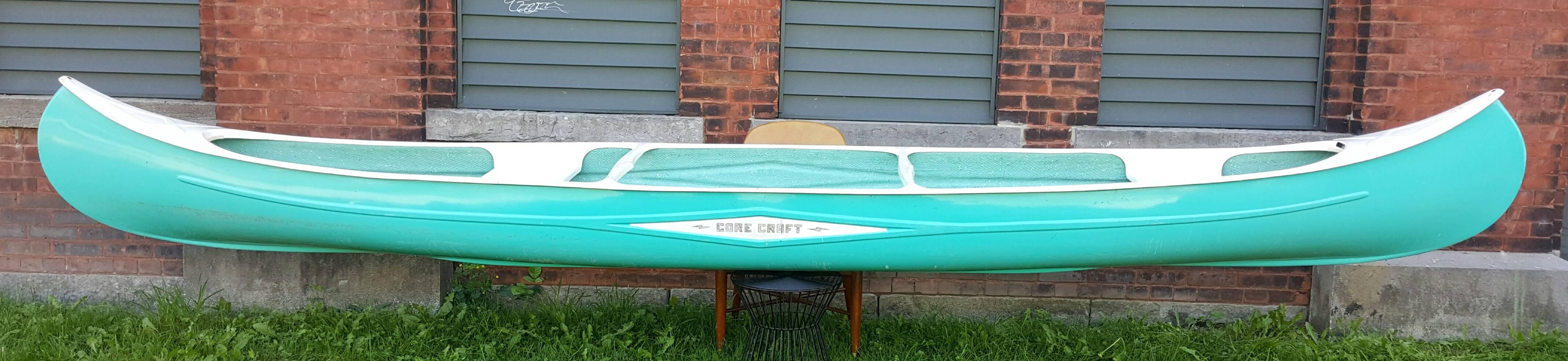 Fabulous turquoise and white fiberglass canoe manufactured by Core Craft, circa 1961-1917. Amazing quality, stunning modernist lines, nice original condition.