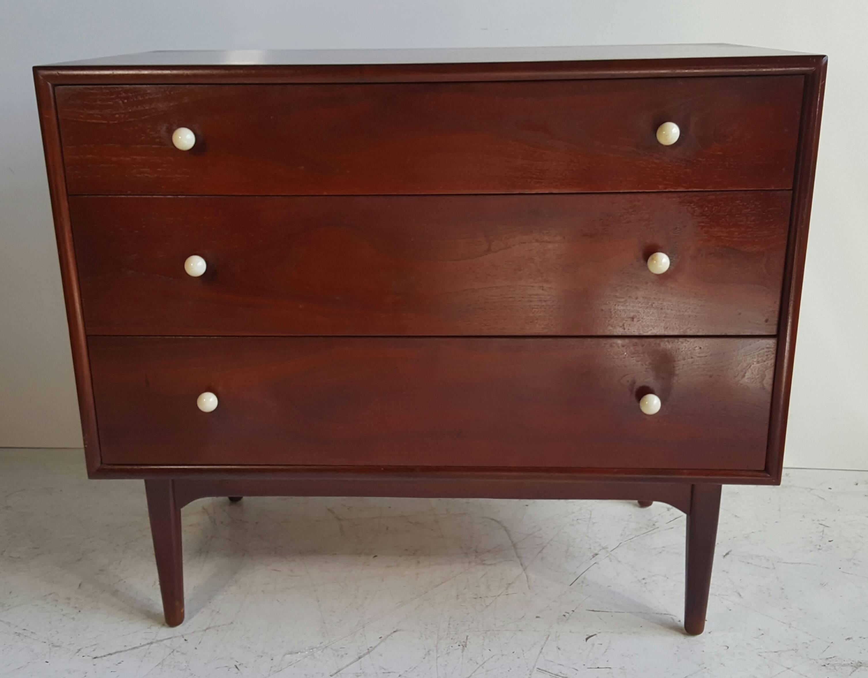 Classic Mid-Century Modern three-drawer chest designed by Kipp Stewart, part of Drexel's Declaration line. Solid walnut, superior quality and construction. Wonderful sleek, elegant, simple styling.