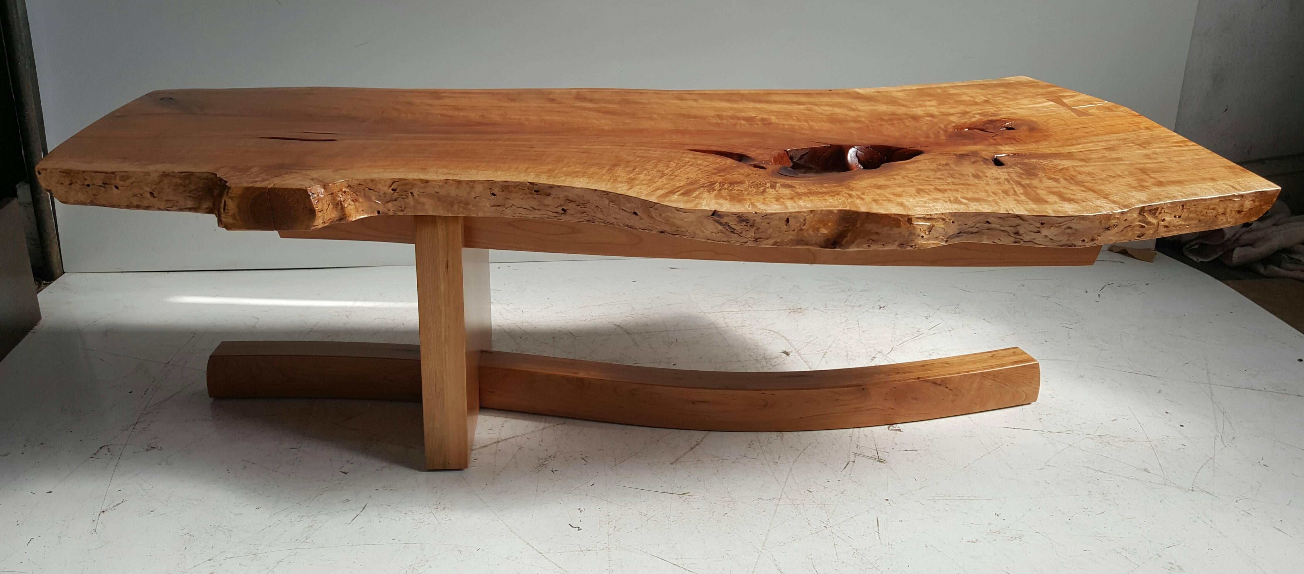 Figured cherry modernist table, Griff Logan.
Exhibits : 2013 arts council for wyoming county, Perry, NY, “local color” 2007–present ashwood artisans, east aurora, NY education: 1987-1988 graphic careers design school, Rochester, NY, illustration,