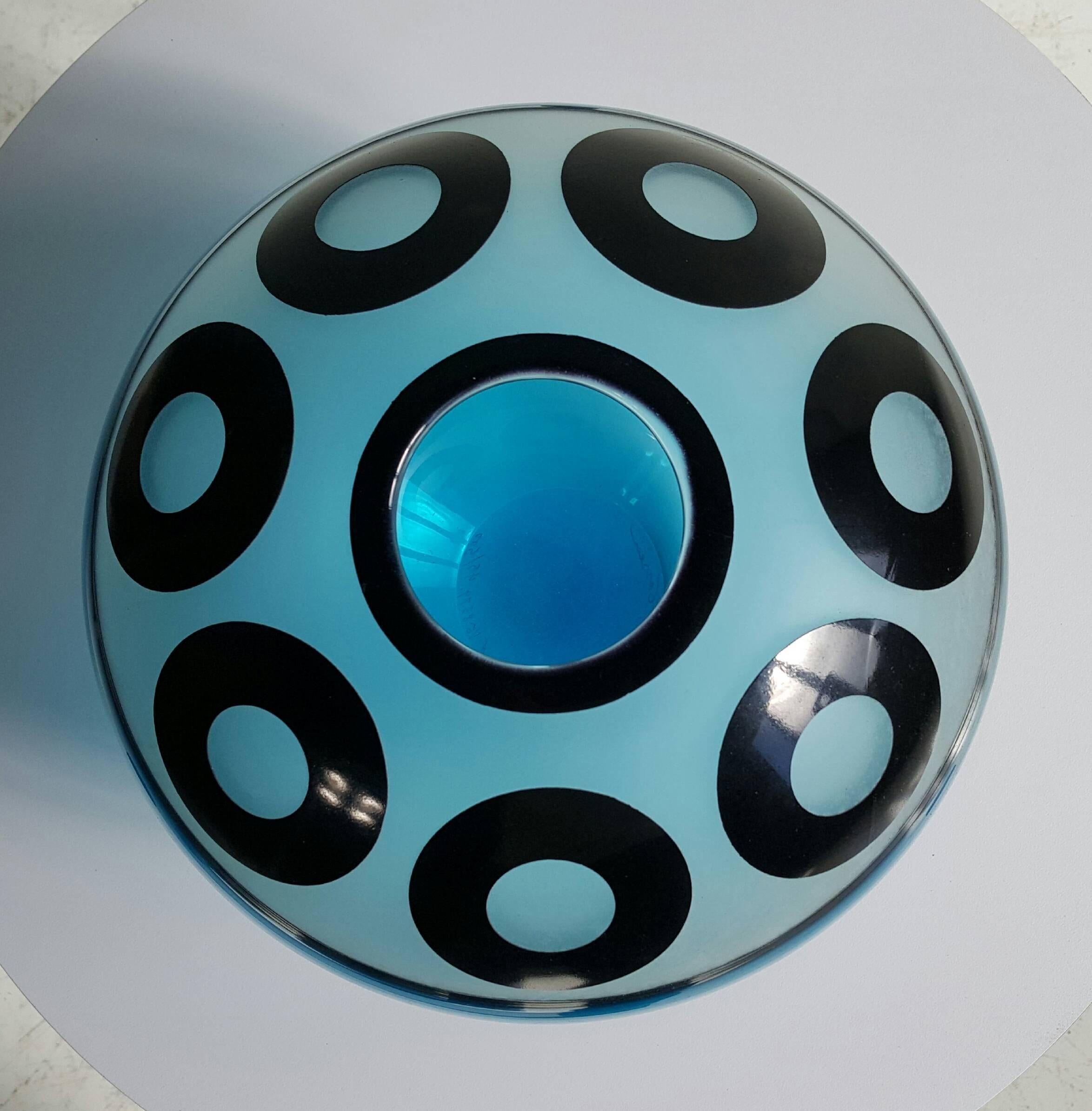 Beautiful handblown art glass sphere, vase, made by famed Correia Art Glass. Signed and numbered, limited edition.

Correia Art Glass is of the highest quality and most elegant design. Its allure is the visual aesthetic of color, form and tactile