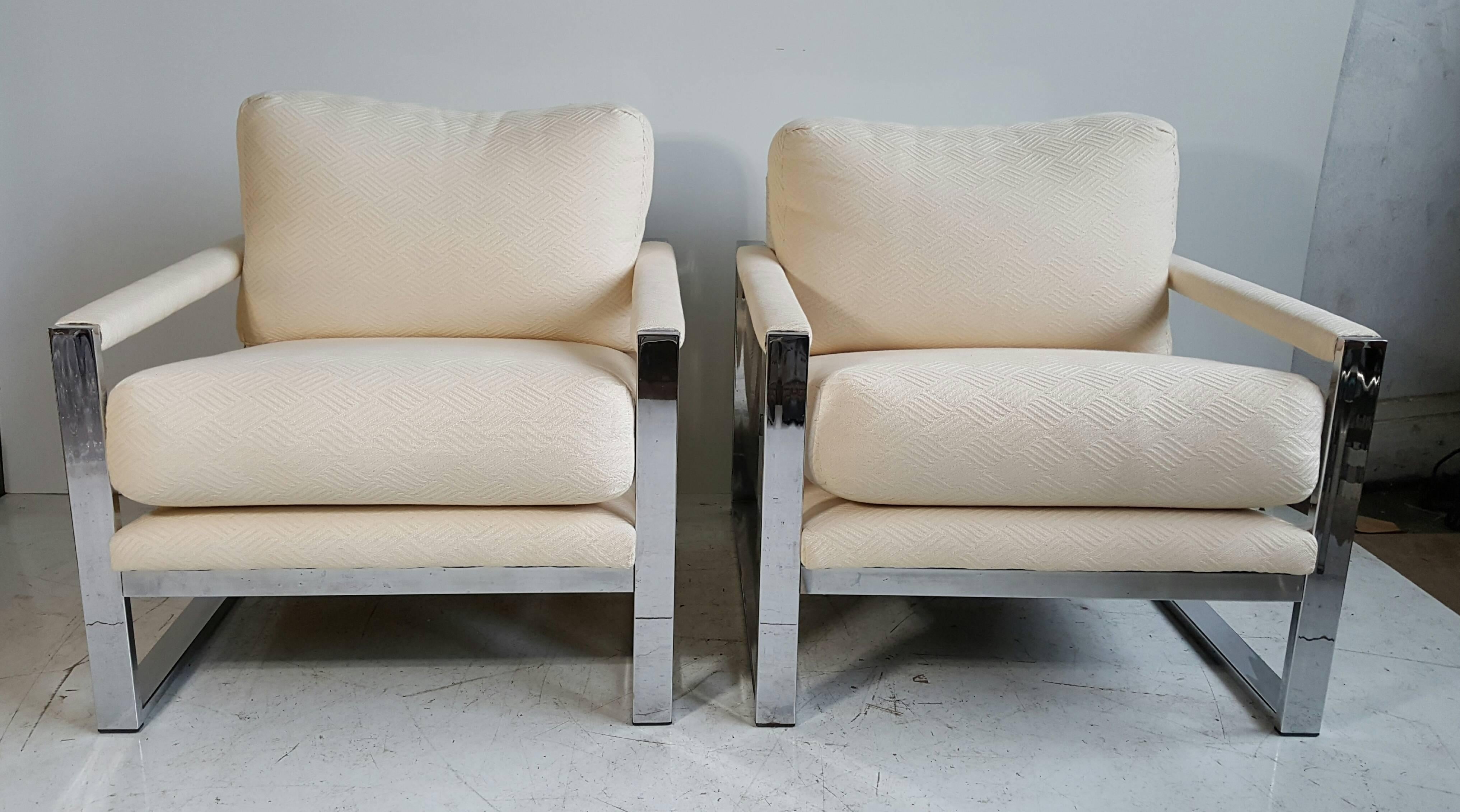 Pair of chrome and fabric lounge chairs, designed by Milo Baughman. Retains original cut cotton wool fabric in great condition. Quality chromed steel frames in beautiful original condition. Classic 1970s modernist. Extremely comfortable.