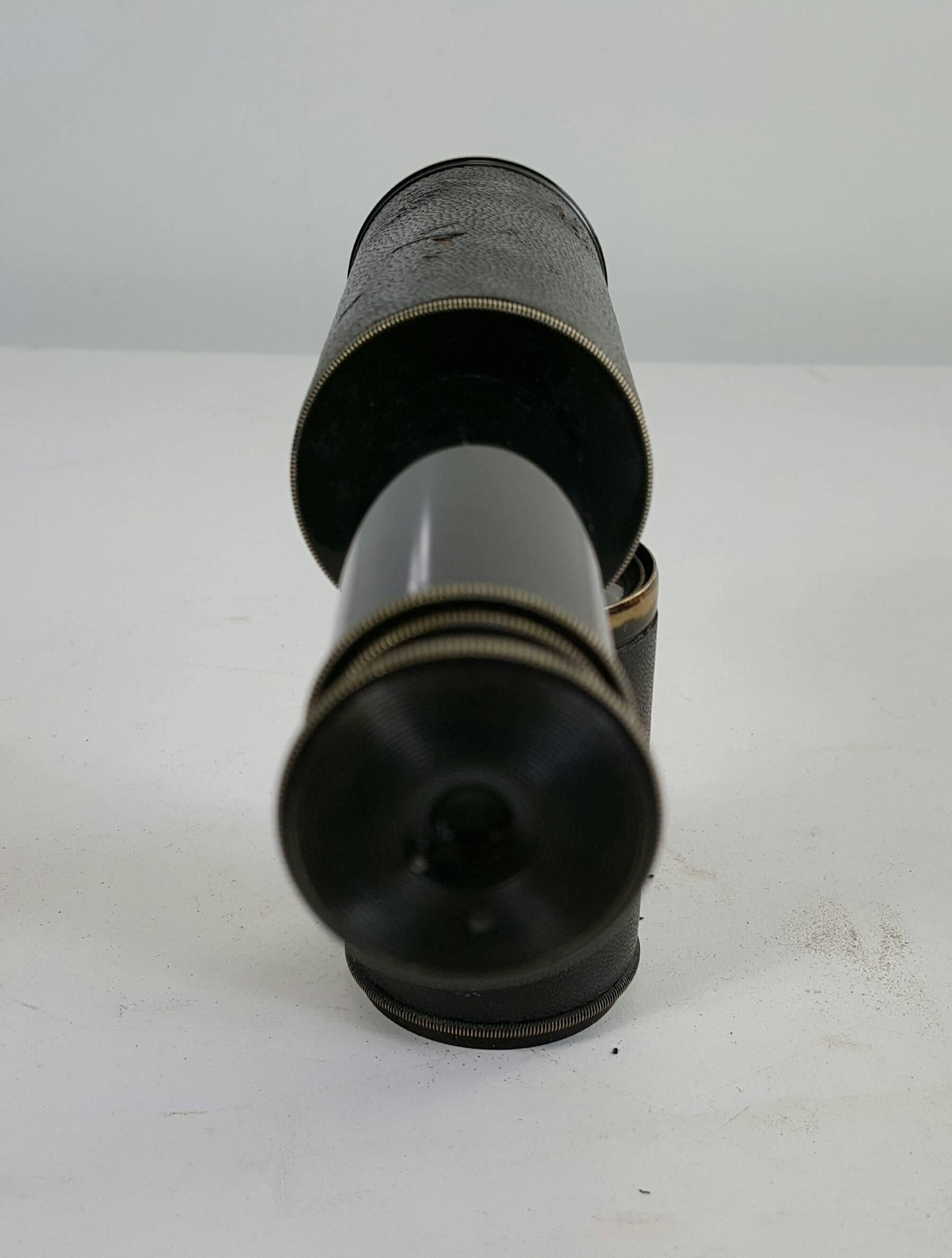 Antique leather wrapped telescope, made by E.Vion, Paris. Handsome little decorative object, nice original condition.