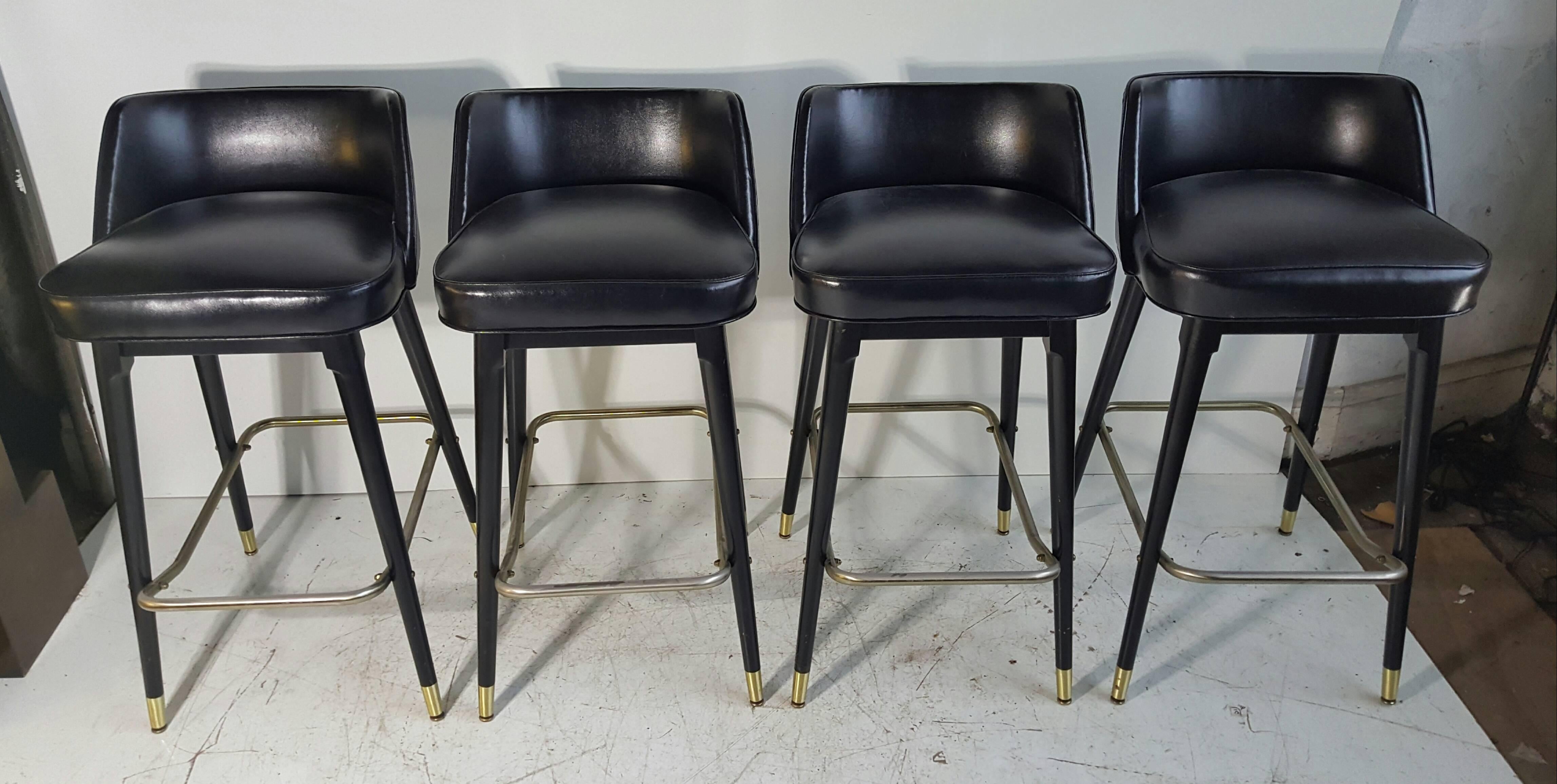 Set of four Classic 1950s, 1960s bar /counter stools by Shelby Williams. Sleek, elegant styling, extremely comfortable. Amazing original condition.