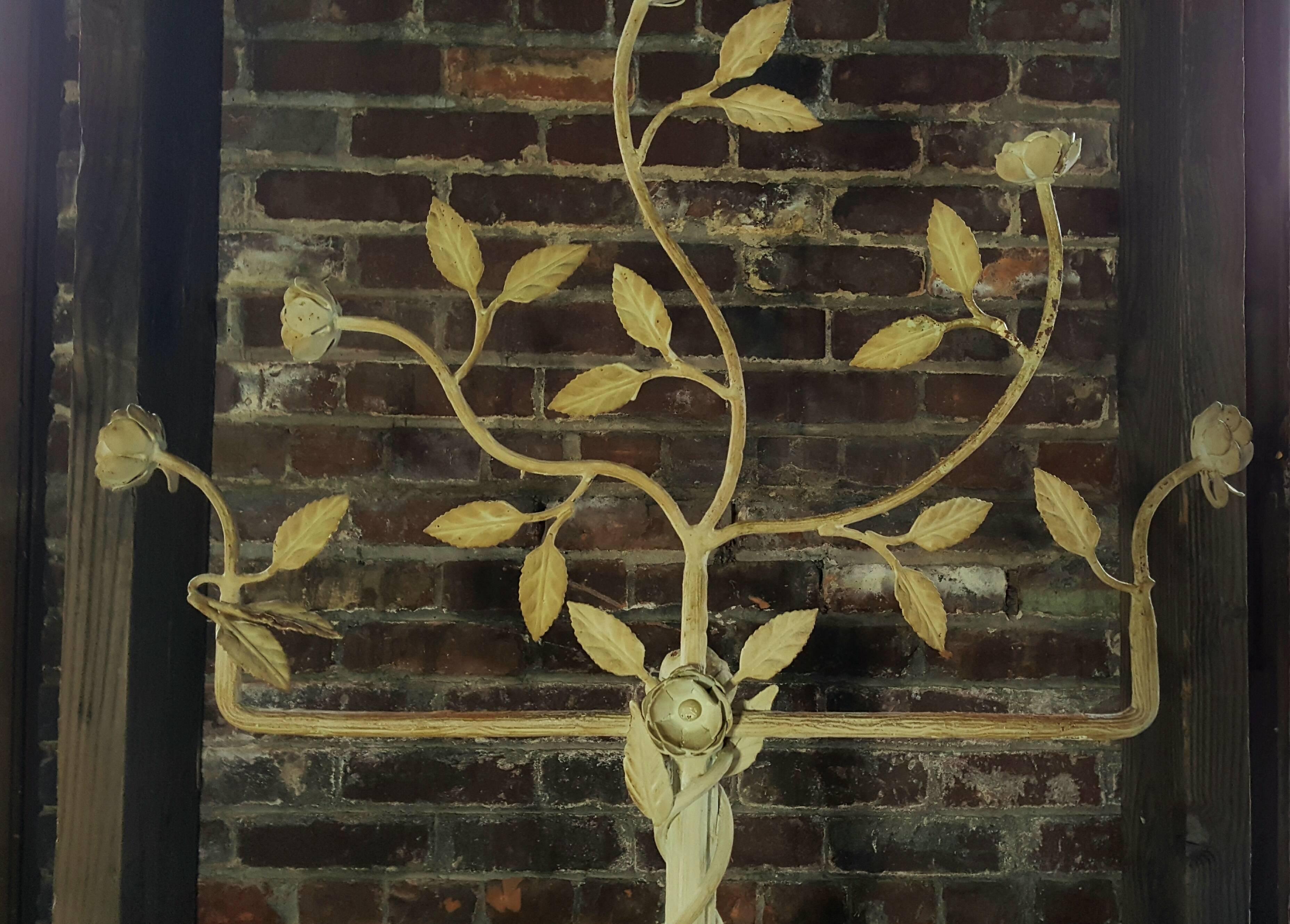 Large iron floral and leaf design store display. Recently salvaged from downtown buffalo New York department store.