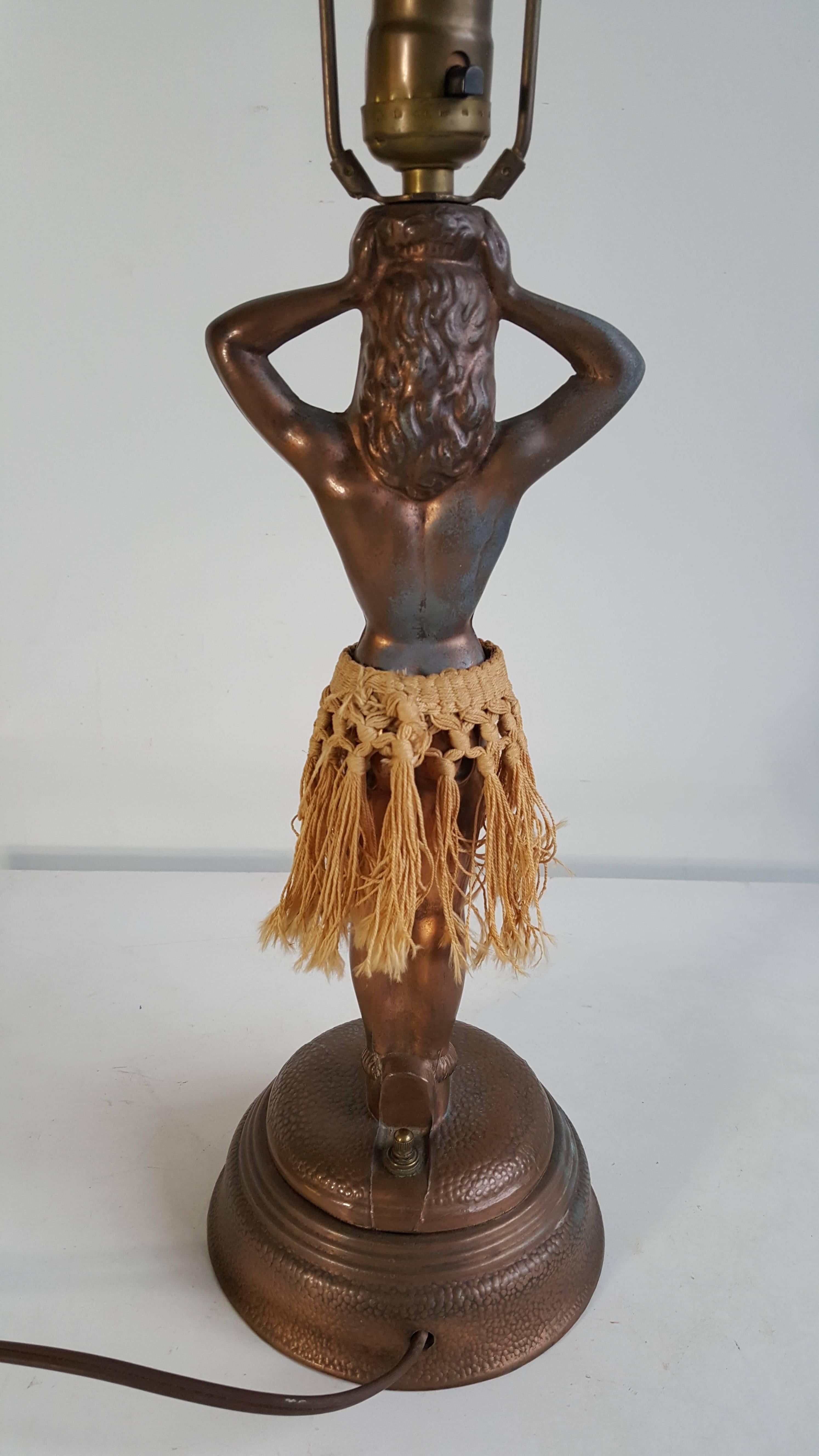 Original hula lamp by Dodge. There are a few different varieties that were made but this one is the nicest looking of them all. The hula girl wiggles and shimmies fine.