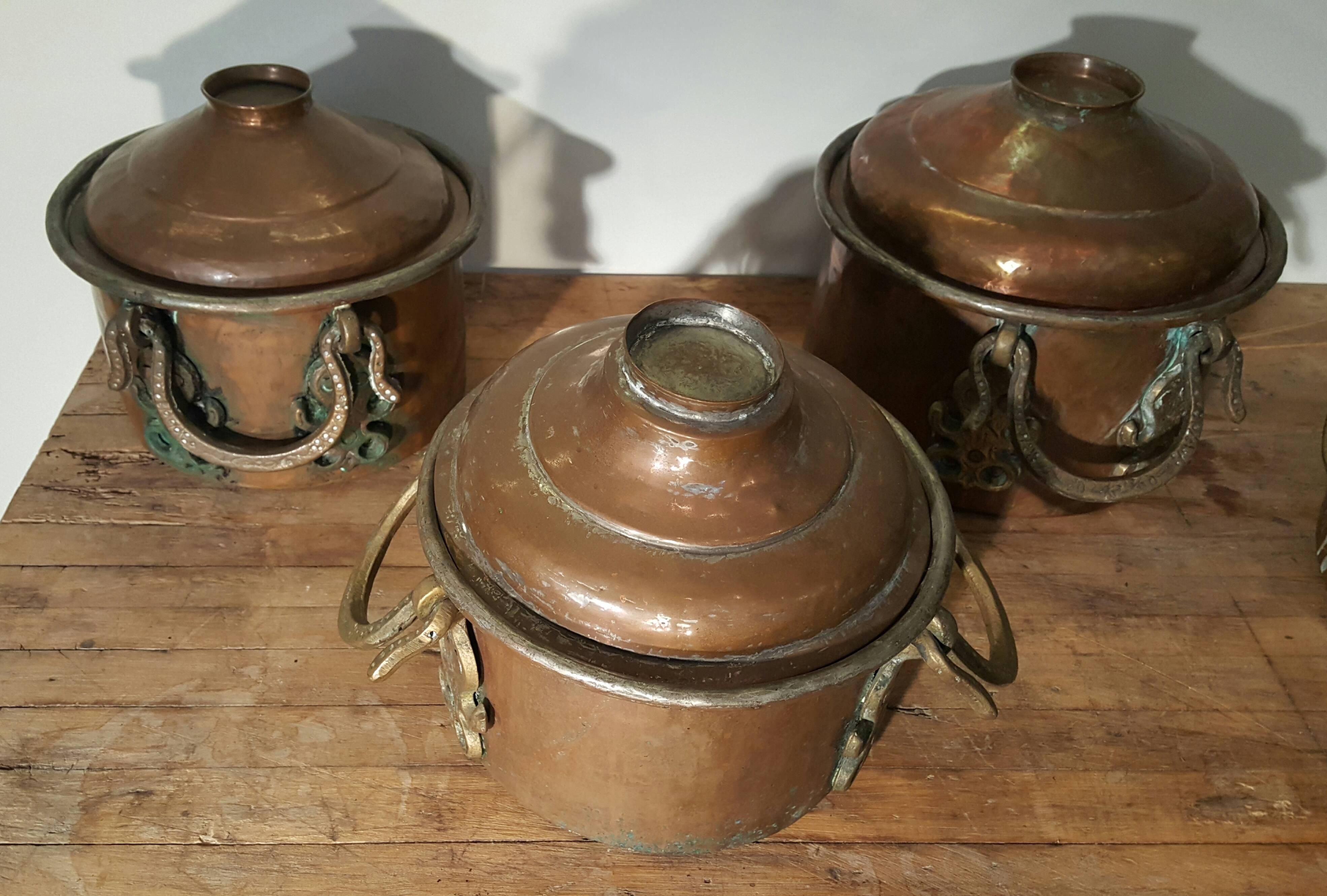 Mid-20th Century Set of Four Arts and Crafts Hand-Hammered Copper Pots