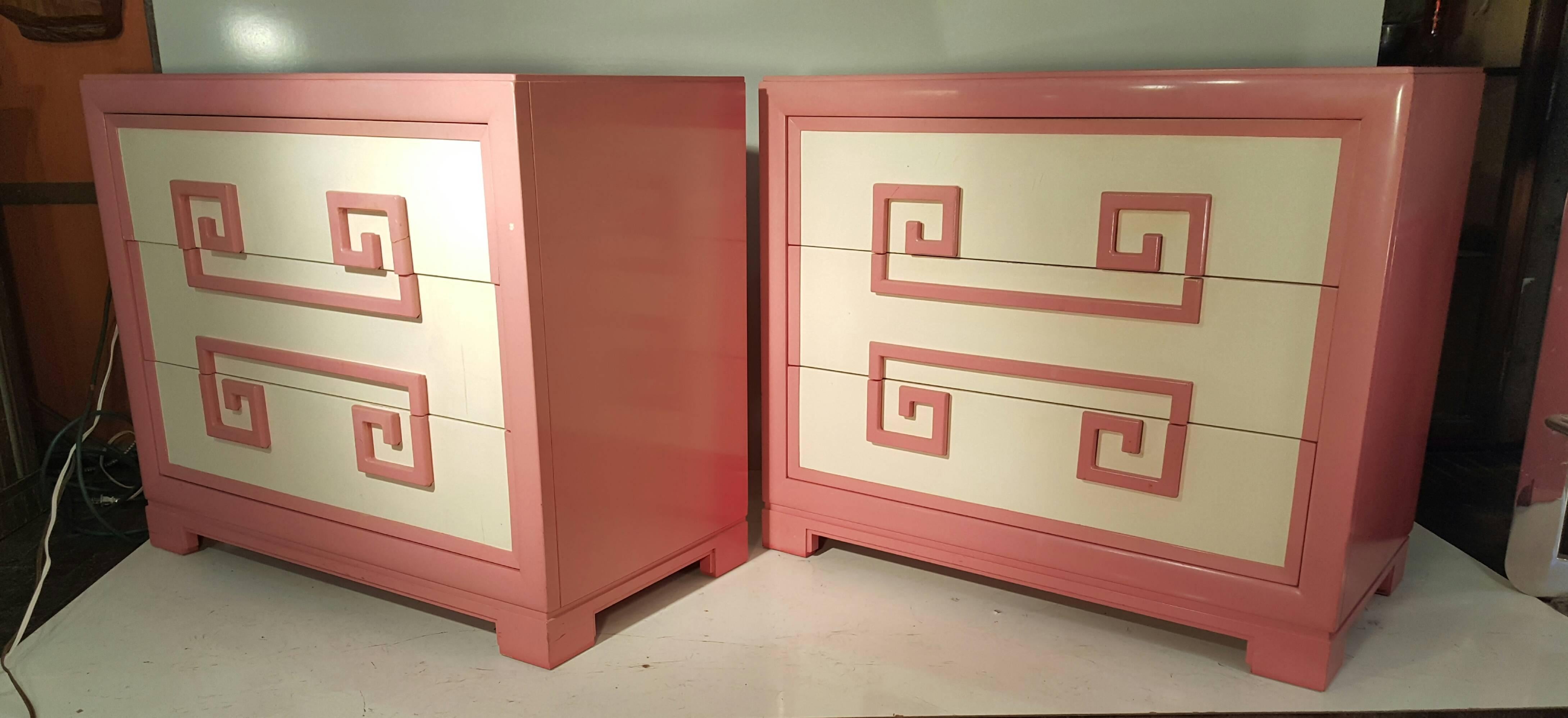 Pair of pink and white lacquered Greek key chests by Kittinger. Top drawers have sliding sock or jewelry compartments. Second drawers have adjustable dividers. Stunning design, exceptional quality.