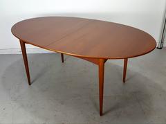Modernist Teak Expandable Dining Table, Made in Denmark, Rare Butterfly Leaf