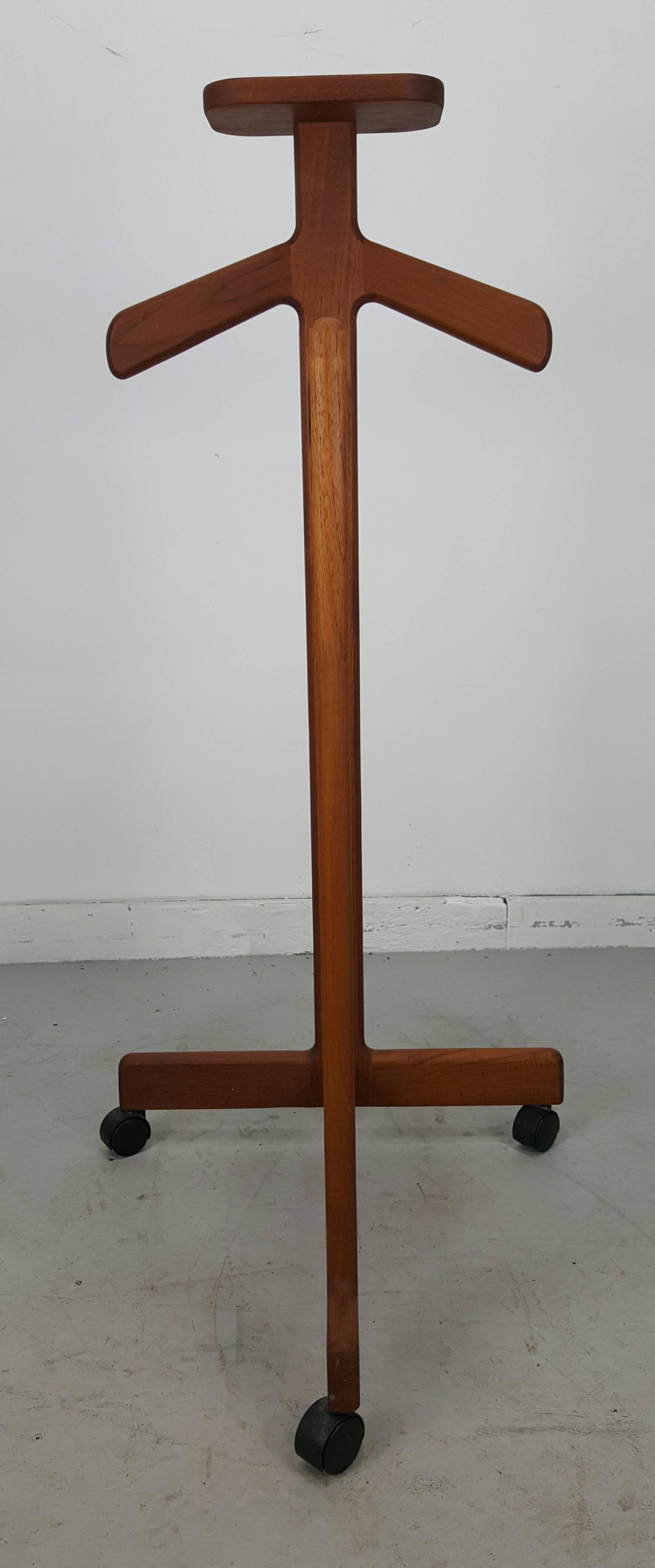 Mid-Century Modern teak valet by Johannes Sorth, Bornholm, Denmark. Amazing architectural design and proportion. Classic Danish teakwood joinery.