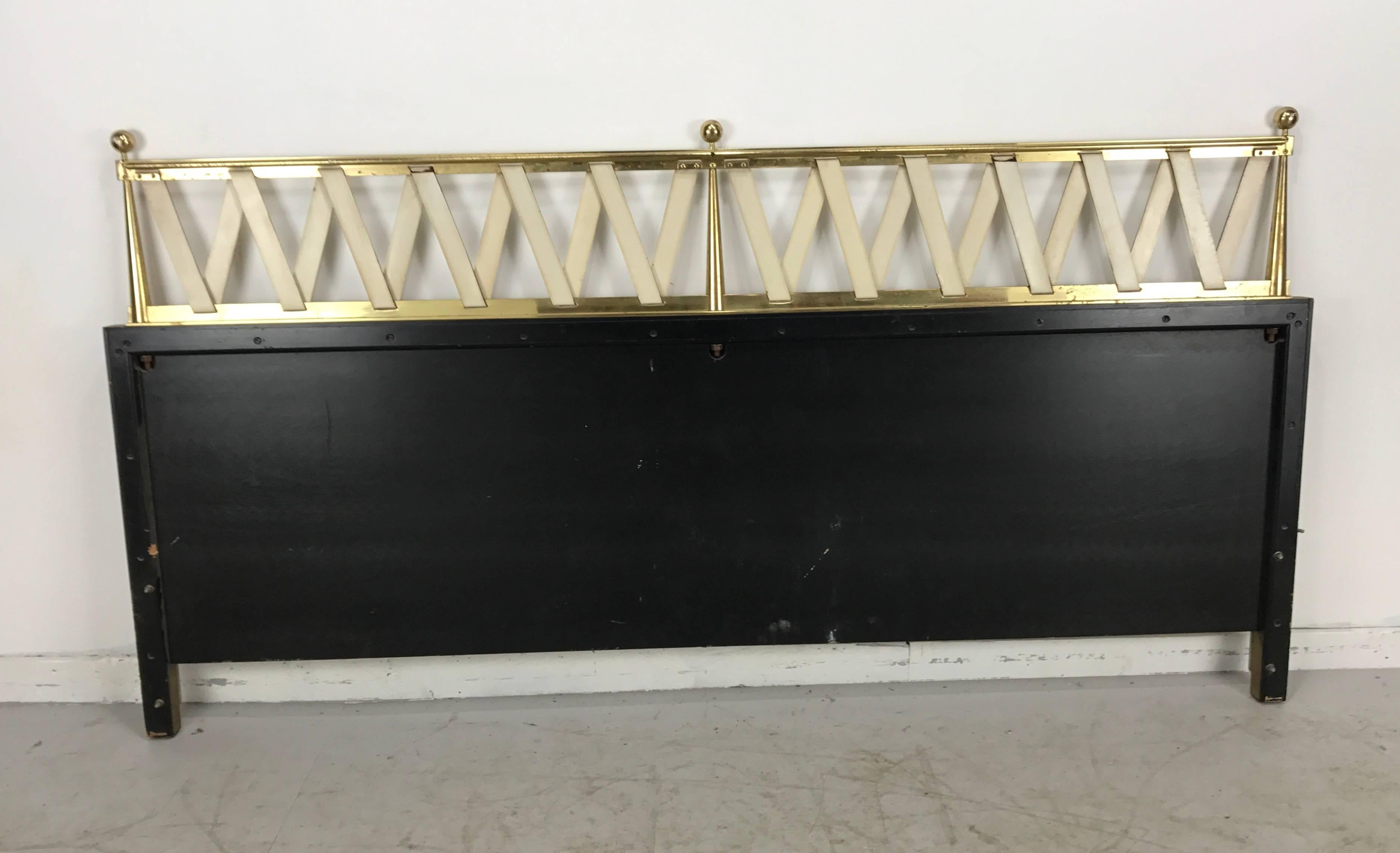 Hollywood Regency,Mid Century, King Size Headboard/bed, sleek, sophisticated design, featuring white lacquer framed in brass, white leather cross straps within conical and ball finial design.