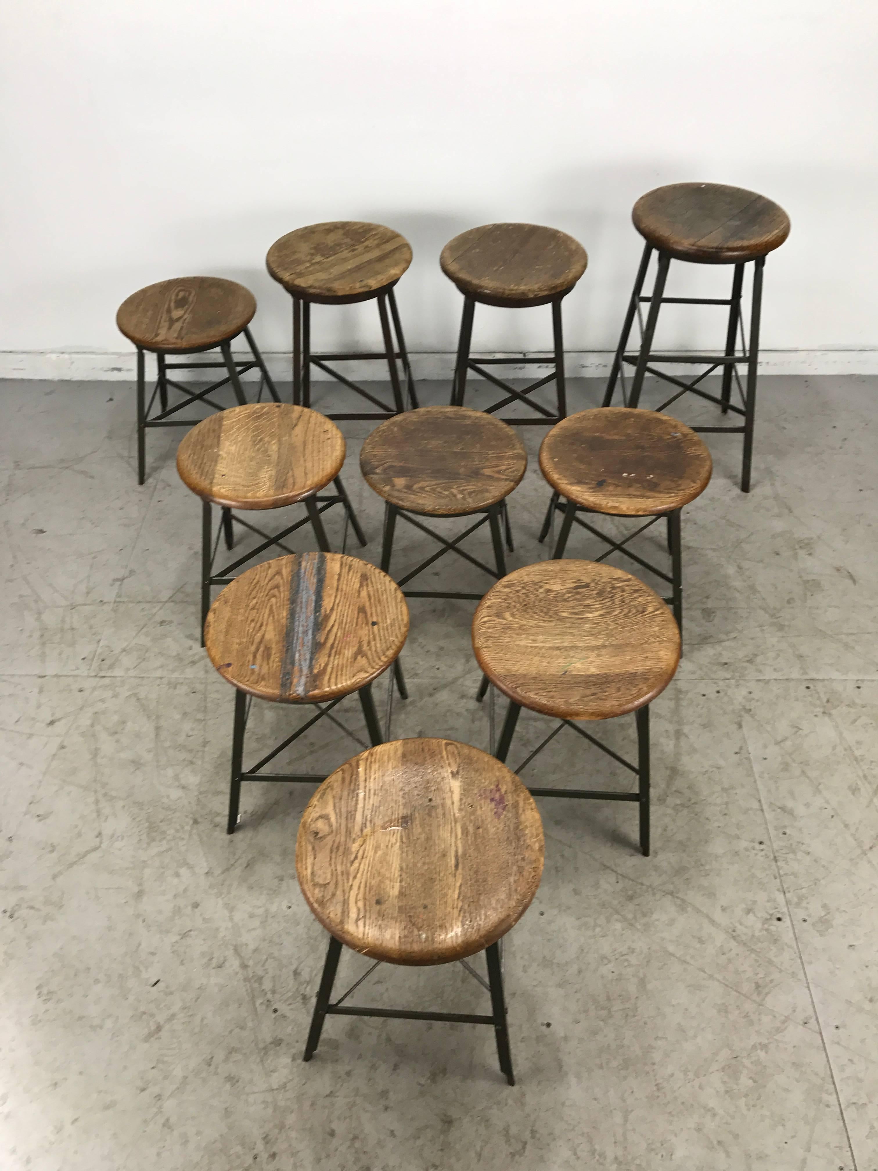 Set of 8 Industrial Stools in Various Heights, Wood Top/Metal Base, 1920s  In Distressed Condition In Buffalo, NY