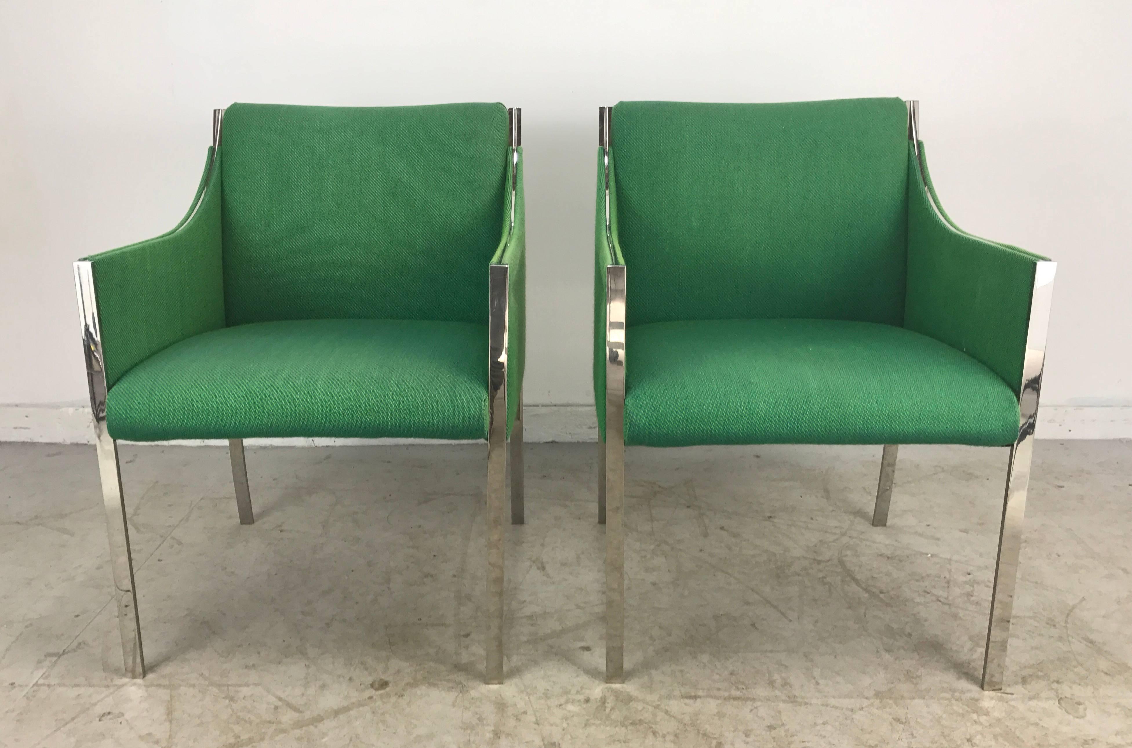 Stunning pair of lounge chairs designed by Jens Risom, stainless steel frames, superior quality, flawless welds, retains original Knoll electric green wool upholstery, stunning.