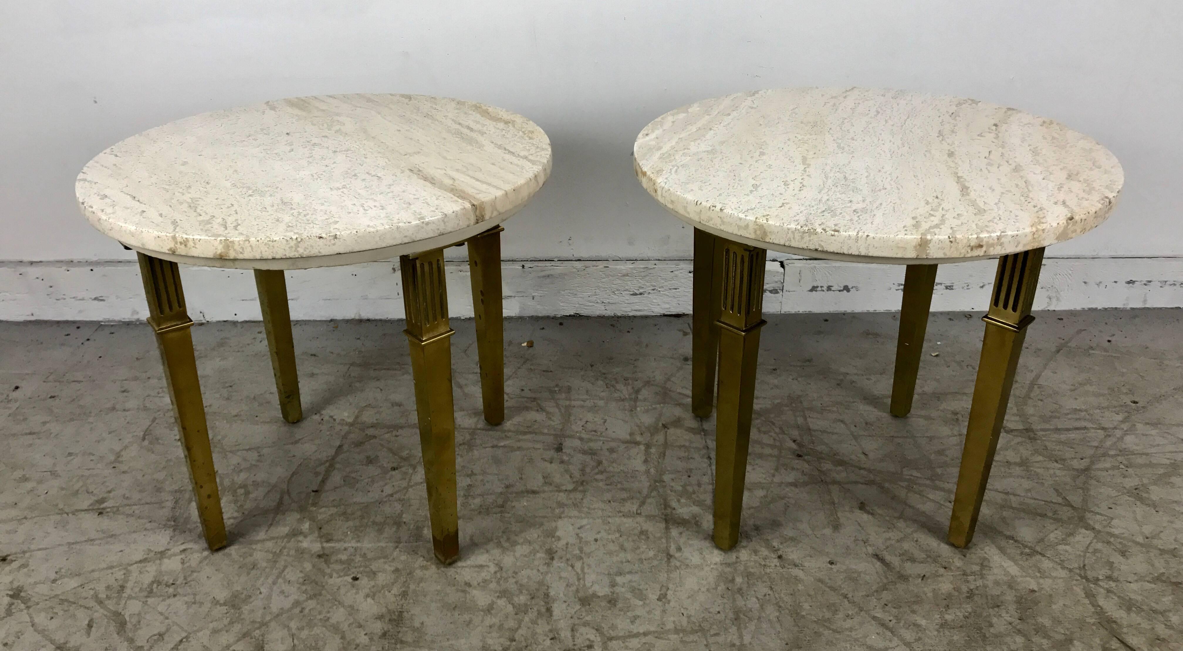 Stunning pair of Hollywood Regency occasional tables, beautiful Italian marble tops. Solid brass legs, fluted capital design. Sleek, simple, elegant.