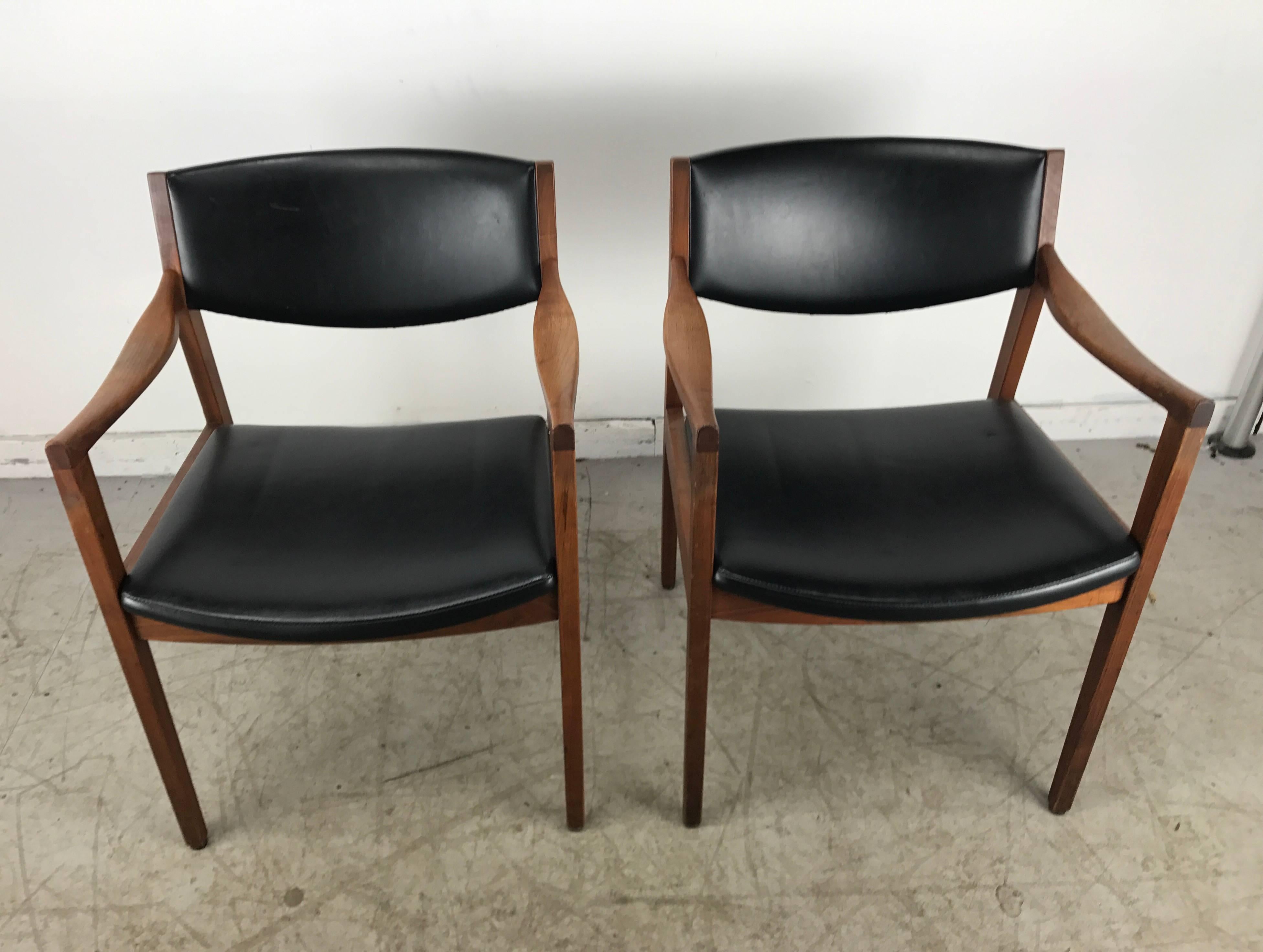 American Stunning Pair of Modernist Oiled Walnut and Black Armchairs by Gunlocke