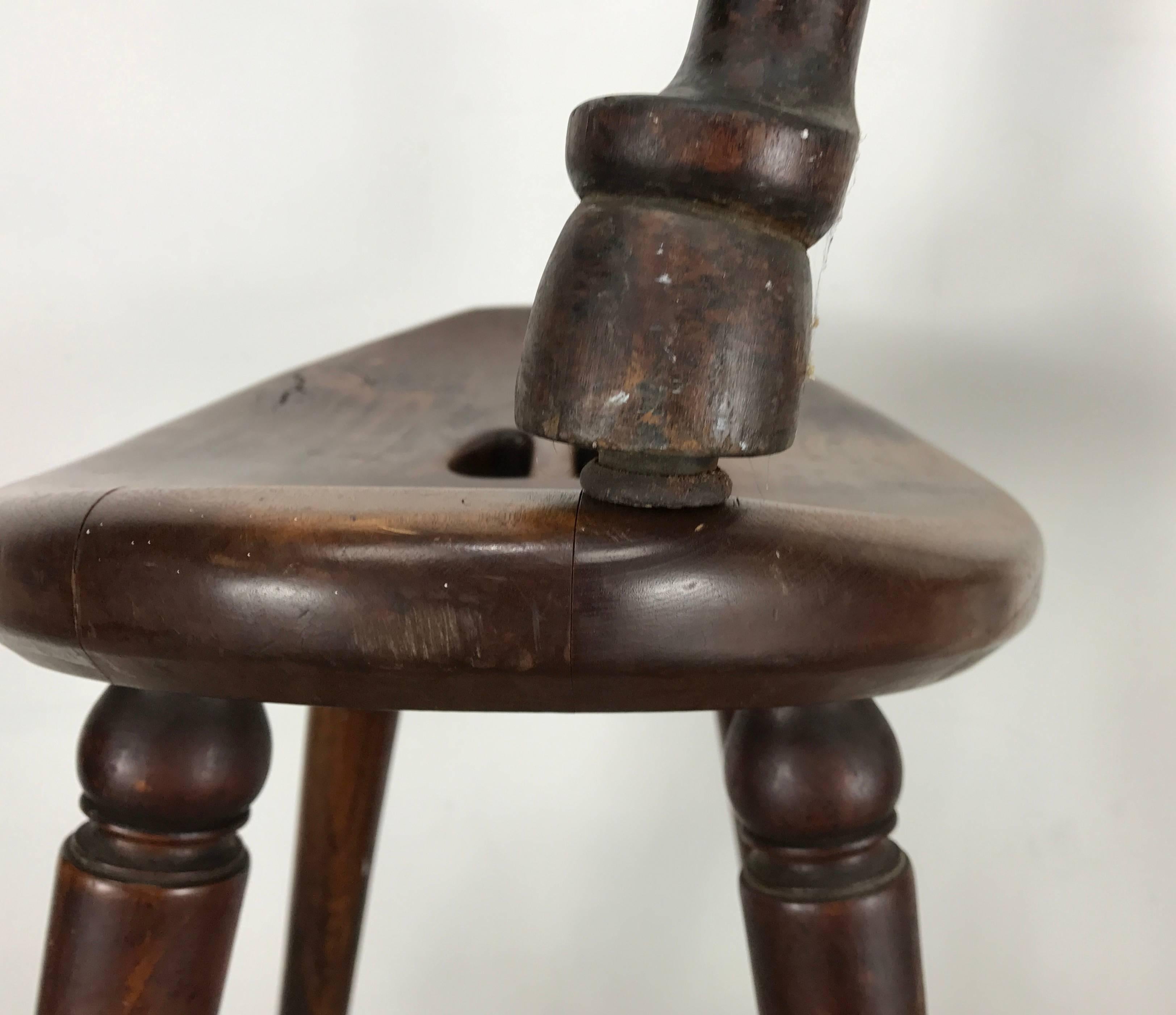 Very unusual set of three matching stools Cowboy Modern Late 1800s featuring solid maple wood construction, hand-carved tops, turned legs terminating with hoof design detail. Amazing patina, color and finish. Extremely comfortable. Superior quality