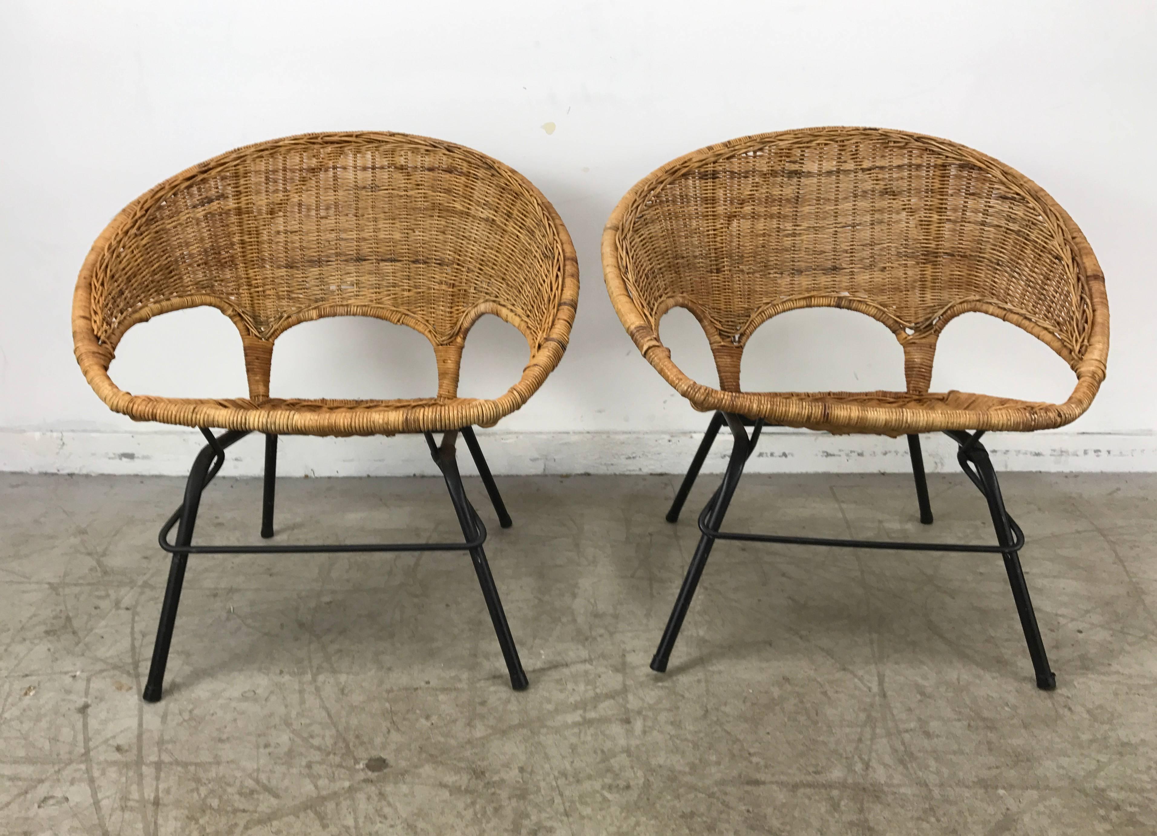 Classic Mid-Century Modern wicker and iron hoop chairs by Franco Albini. Unusual triple cathedral back design, Indoor or outdoor.