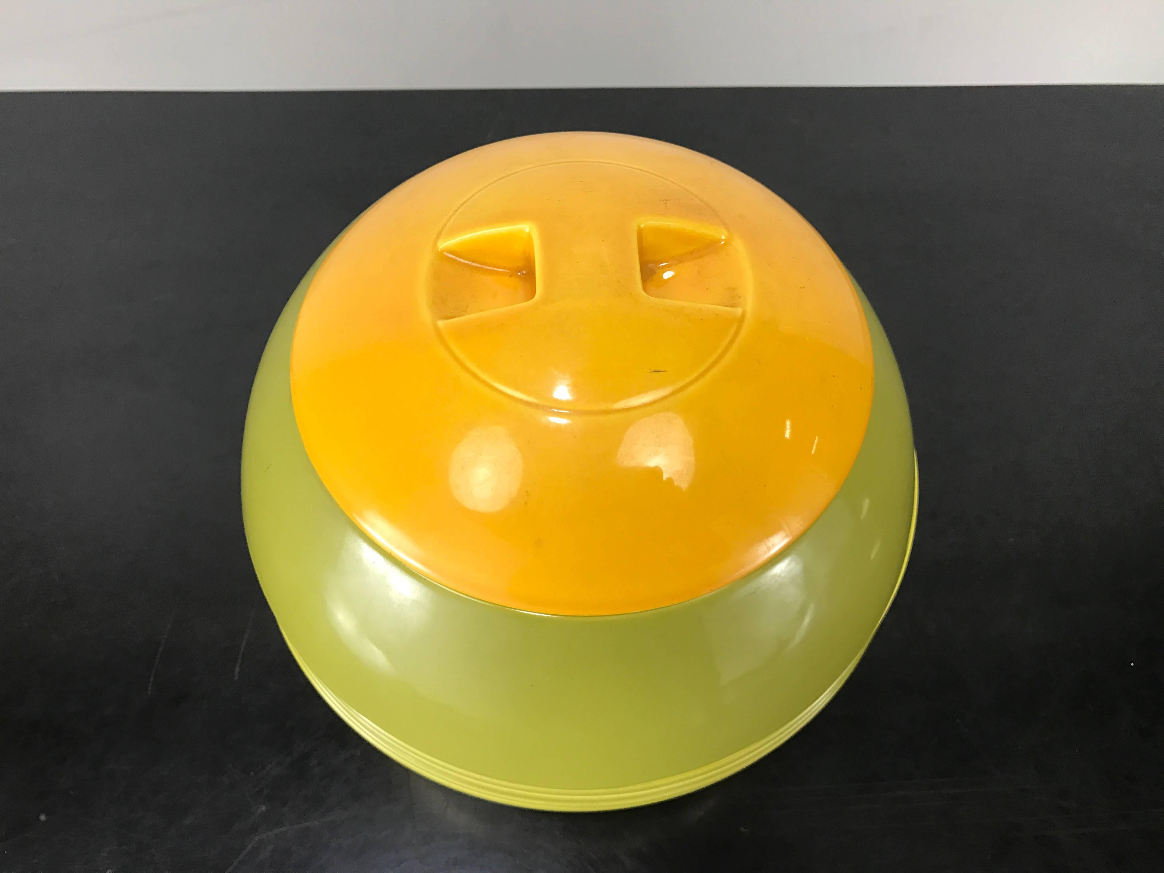 Designed by Helen von Boch in the early 1970s, Avant Garde is a set of stacking tableware for four persons that becomes a centrepiece for the the dining room, by forming a ball in different colors , 19 pieces in total, including plates, side dishes