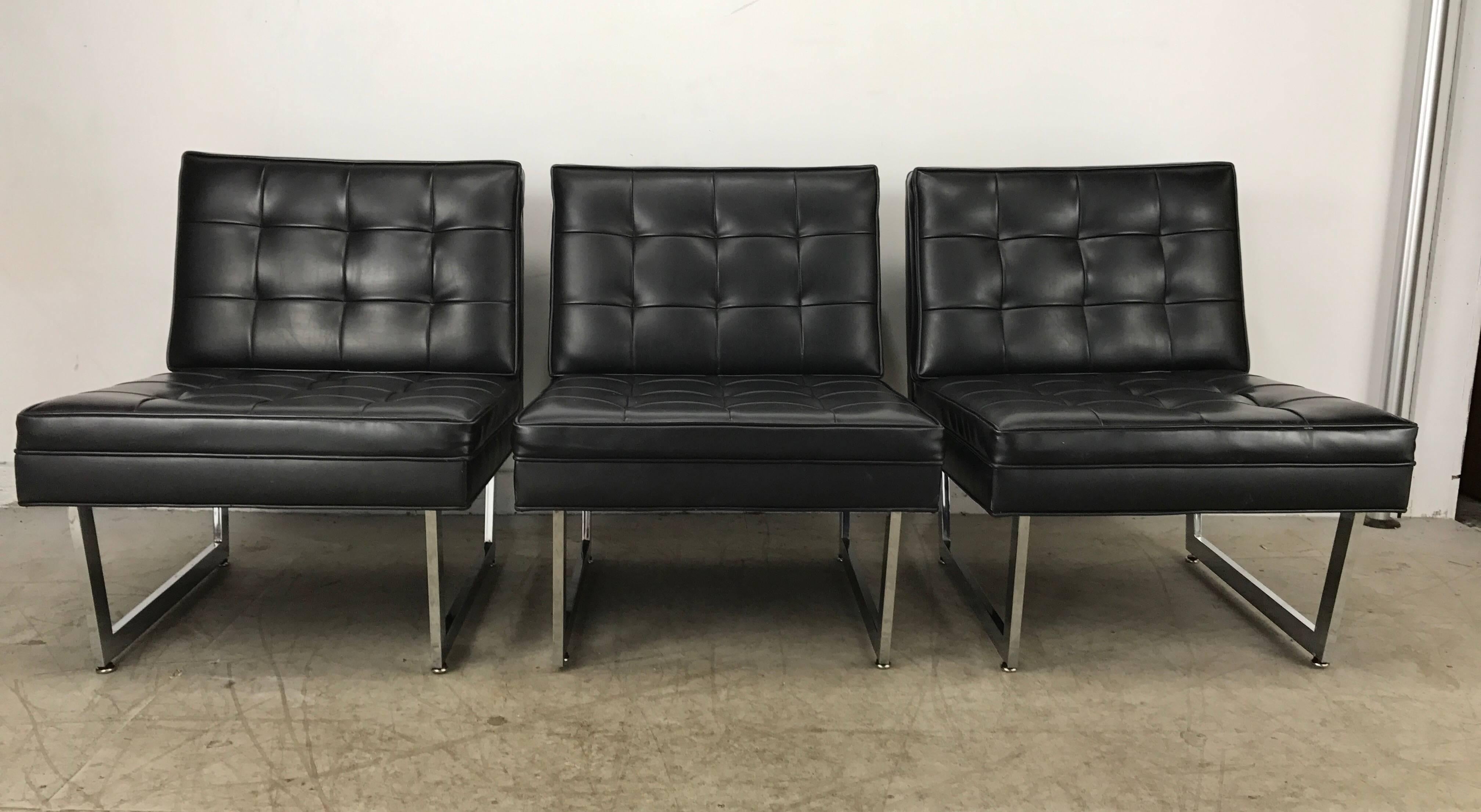 Classic Modernist three-piece modular set, manufactured by Patrician Furniture Company, stunning lines reminiscent of the iconic Tugenhat chair designed by Mies Van der Rohe and Lilly Reich, retains original black Naugahyde seat and back, polished