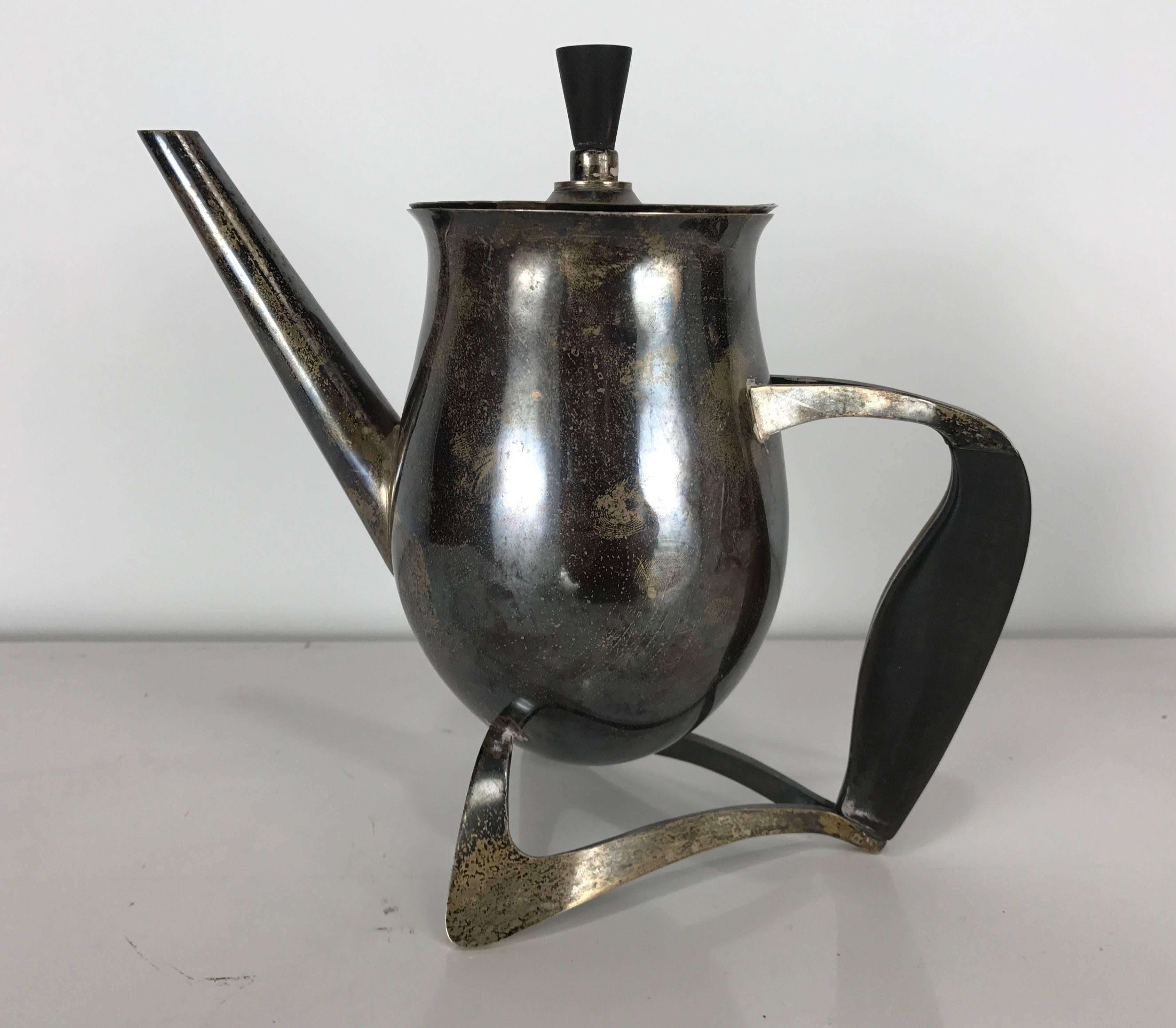 Stunning pure silver coffee and tea set with original renderings (drawings),, Hand executed by Paul Tarantino believed to be designed for Georg Jensen, (never produced), Exaggerated Art Deco, Nouveau design, Set is in as found condition, has not