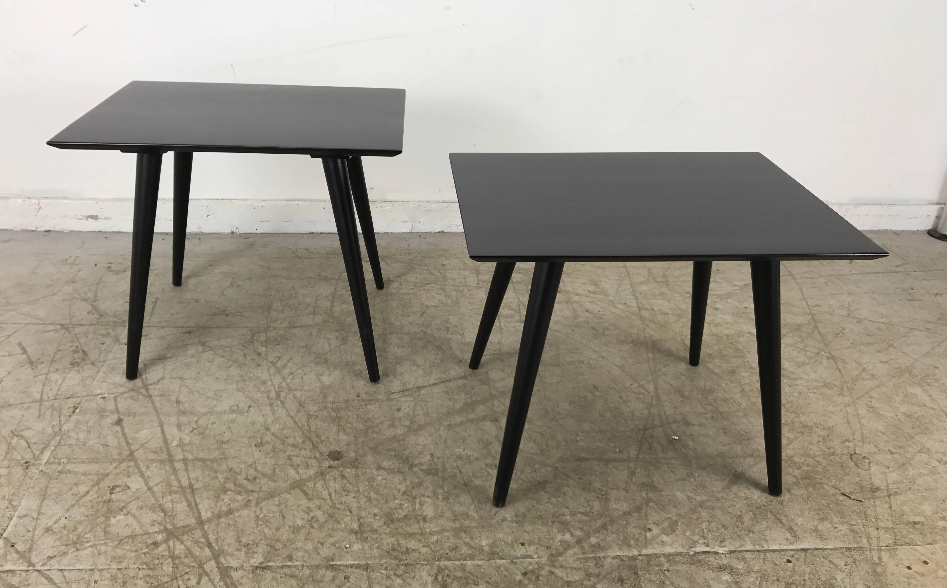 Classic Mid-Century Modern Planner Group end tables designed by Paul McCobb, recently restored, stunning black lacquer finish. I believe these to be 1st year production, early Paul McCobb label, possibly custom ordered since there is a 1 inch height
