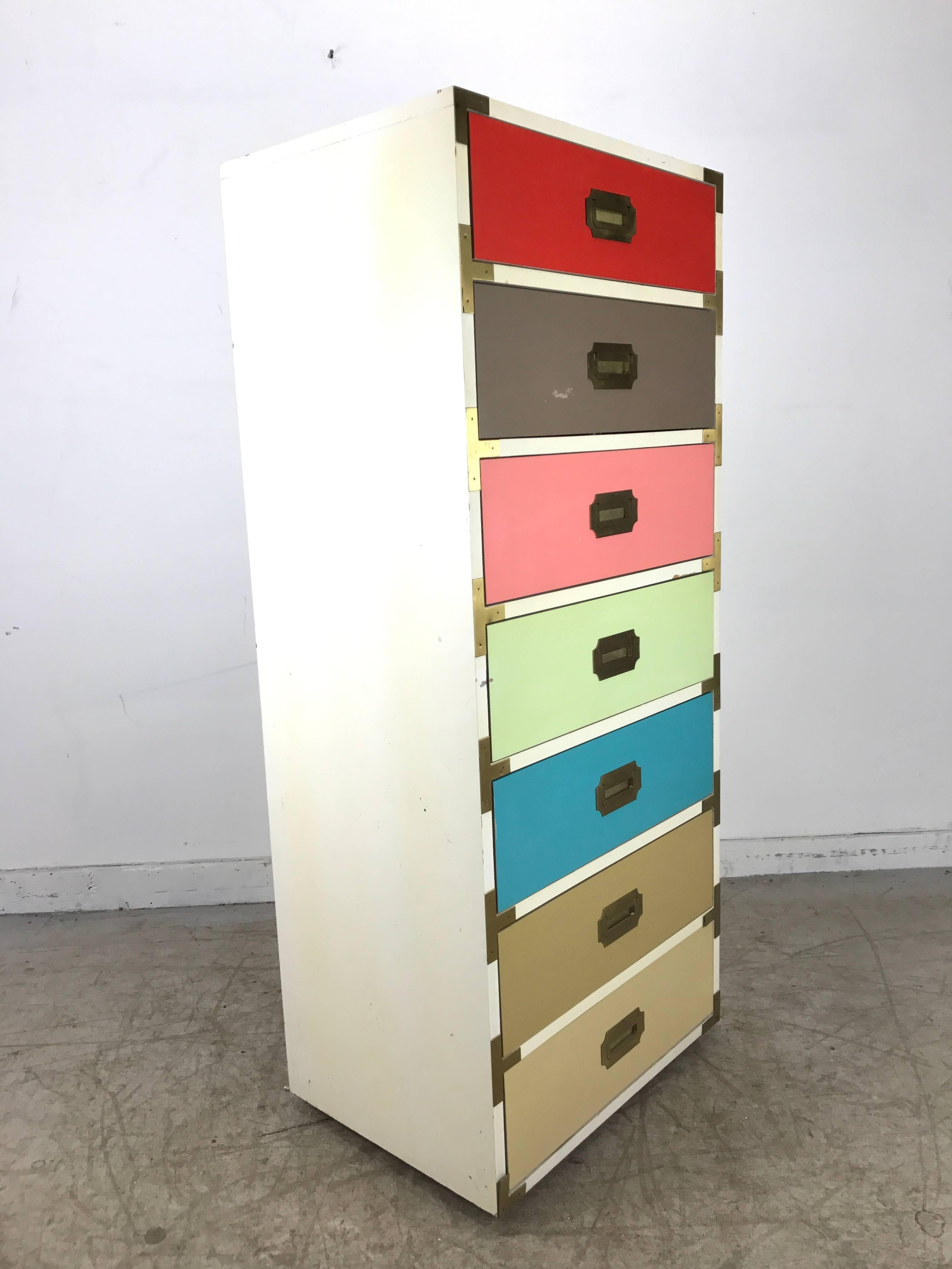 Seven drawer multi-color campaign style tower chest, I believe this piece was originally used in retail furniture showroom as the display model to show potential buyers the various available colors, each drawer retains original color labels. Nice