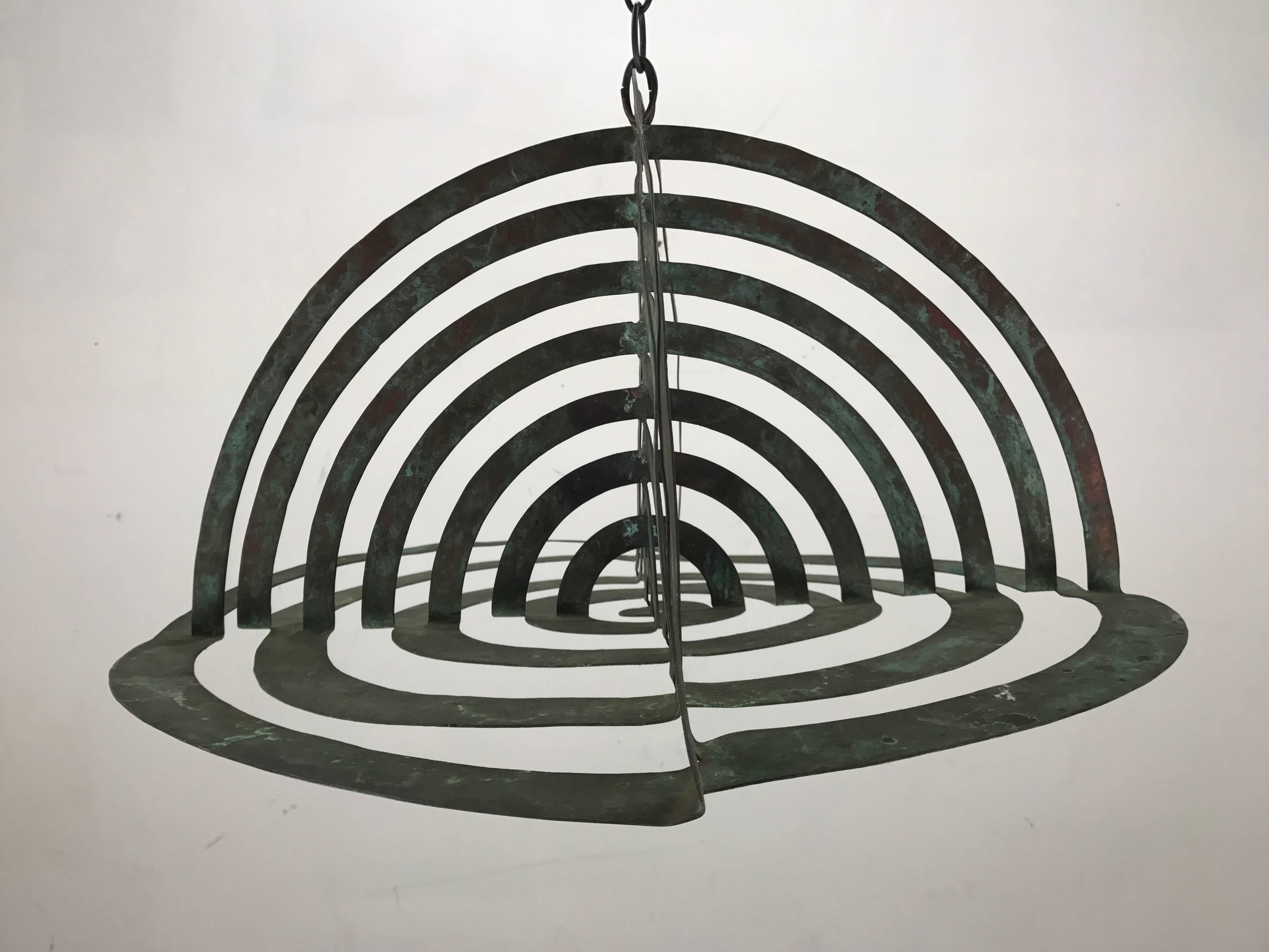 Modernist copper sculpture, indoor or outdoor. Can be hung or placed as stationary element, amazing design made with one continuous copper strip.