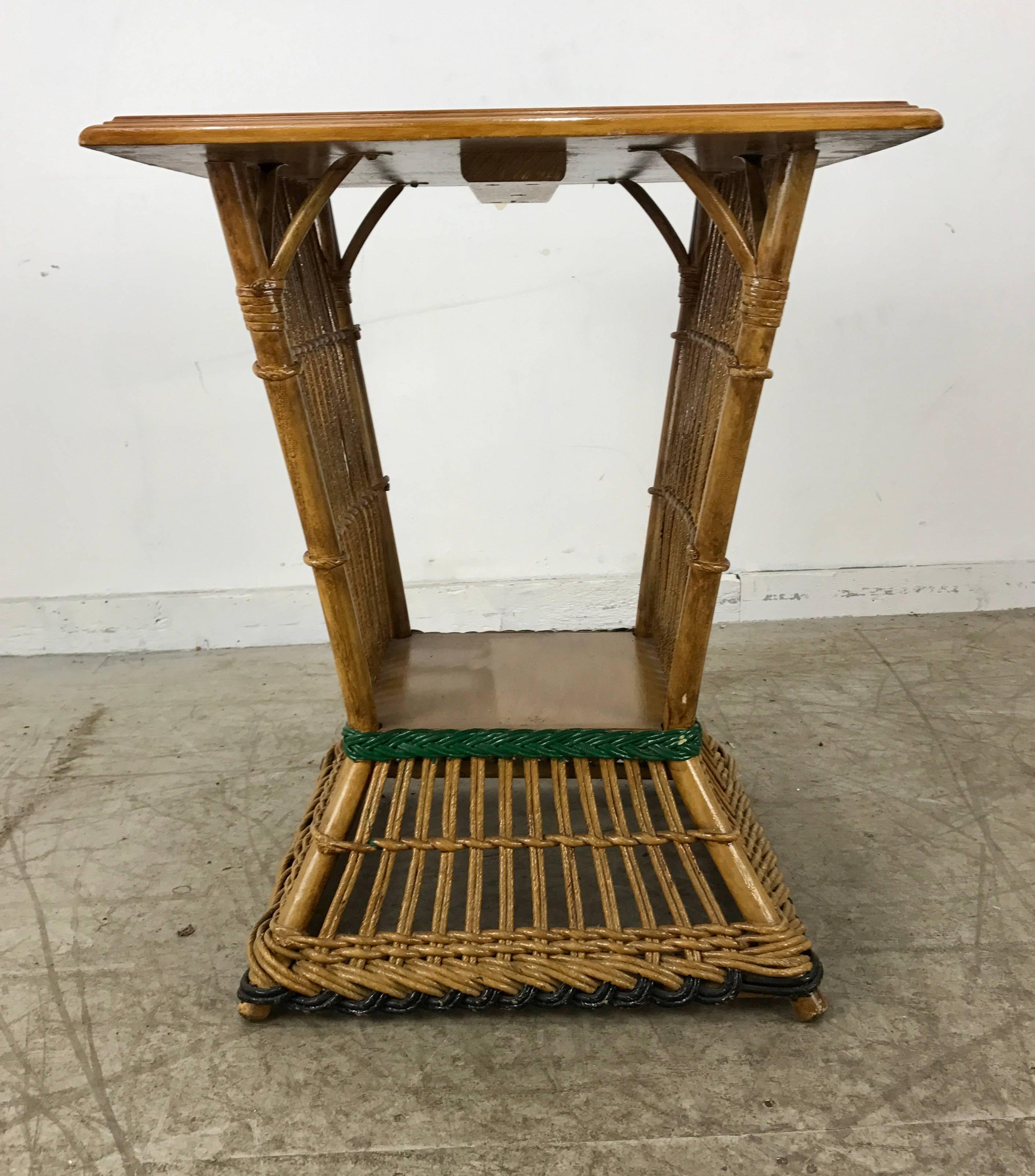 Stunning Art Deco split reed or stick wicker table. Features natural finish with beautiful green and black paint detailing. Also retains original spring cushions, stunning Art Deco 