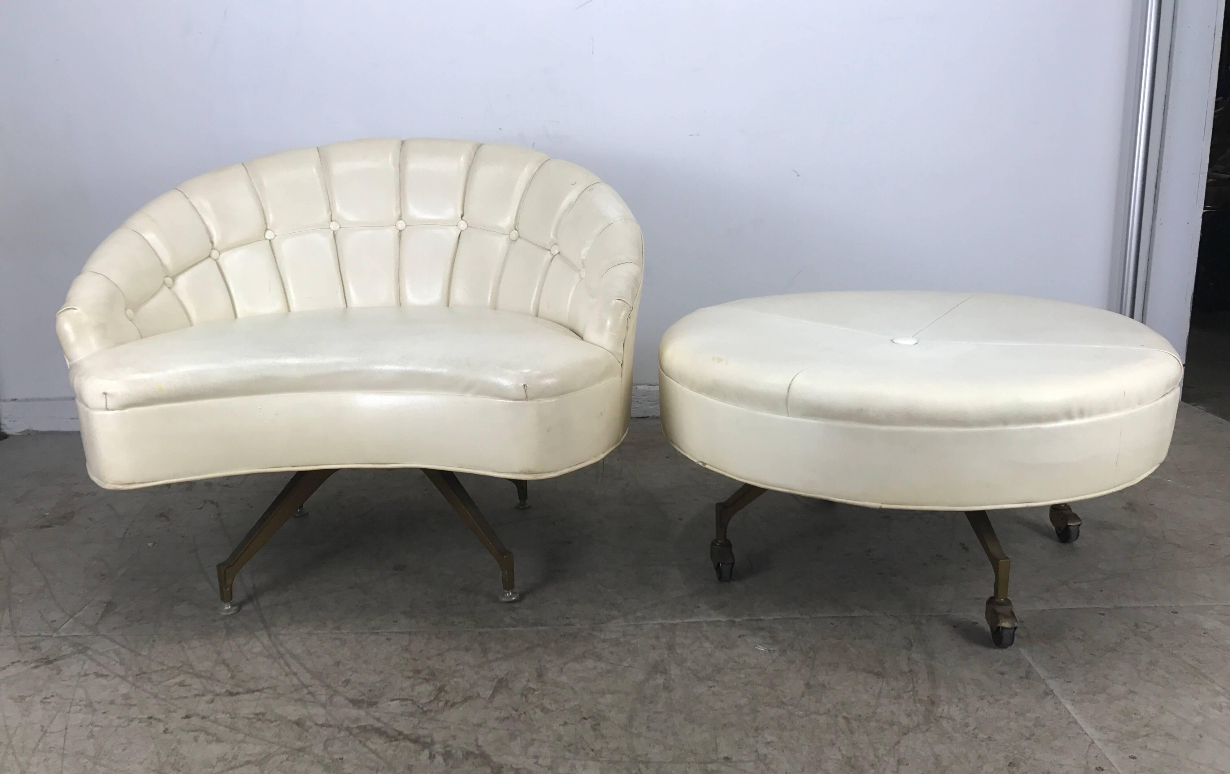 Unusual pop modernist white Naugahyde button tufted barrel lounge chair and round ottoman 32 inches in diameter, on castors, super sexy design, cast aluminium bases, Hand delivery available to New York City or anywhere enroute from Buffalo New York.
