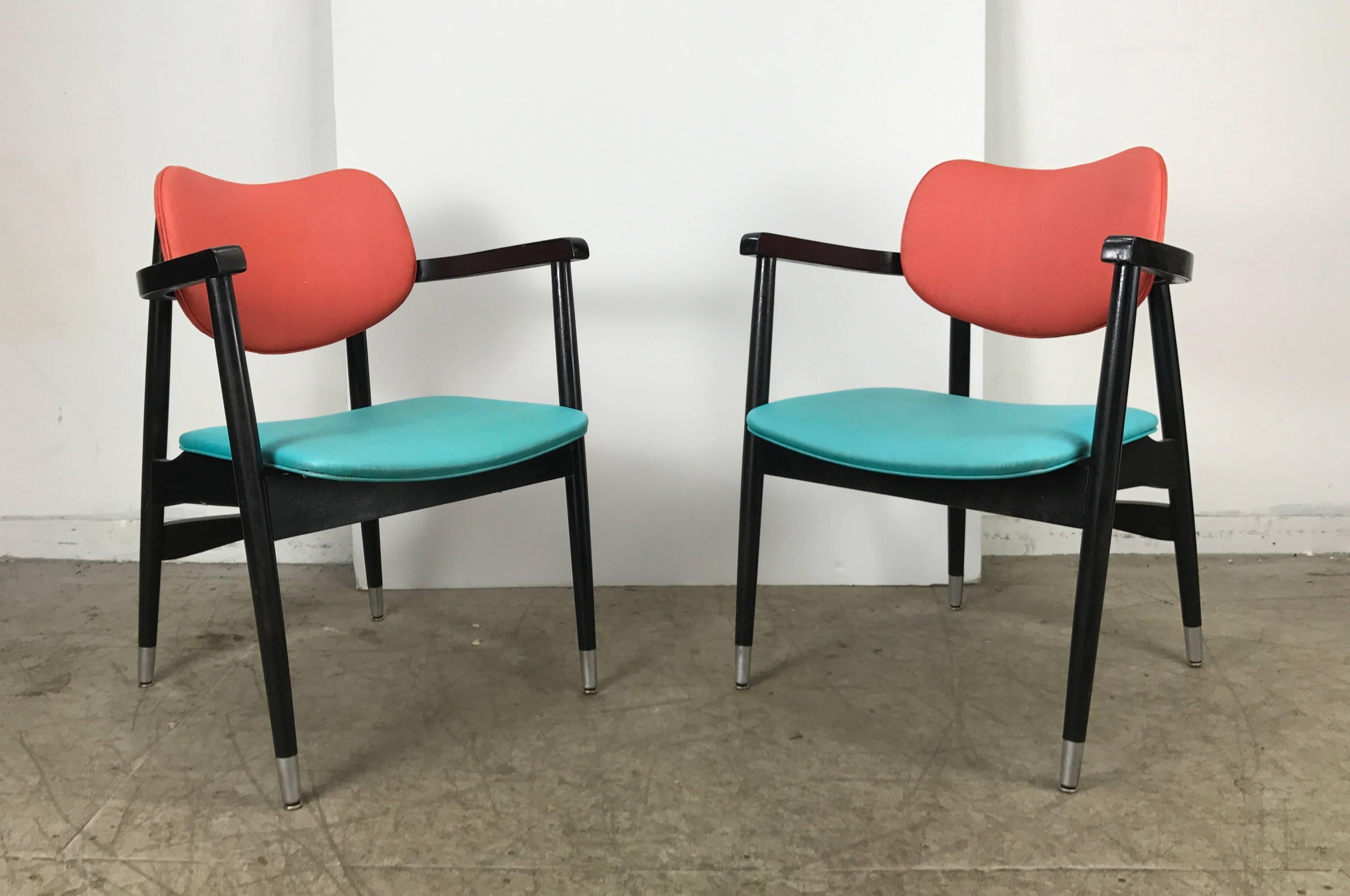 Pair of armchairs by Shelby Williams. Retain original turquoise and orange vinyl seat and back, black lacquer frame. Timeless classic design.