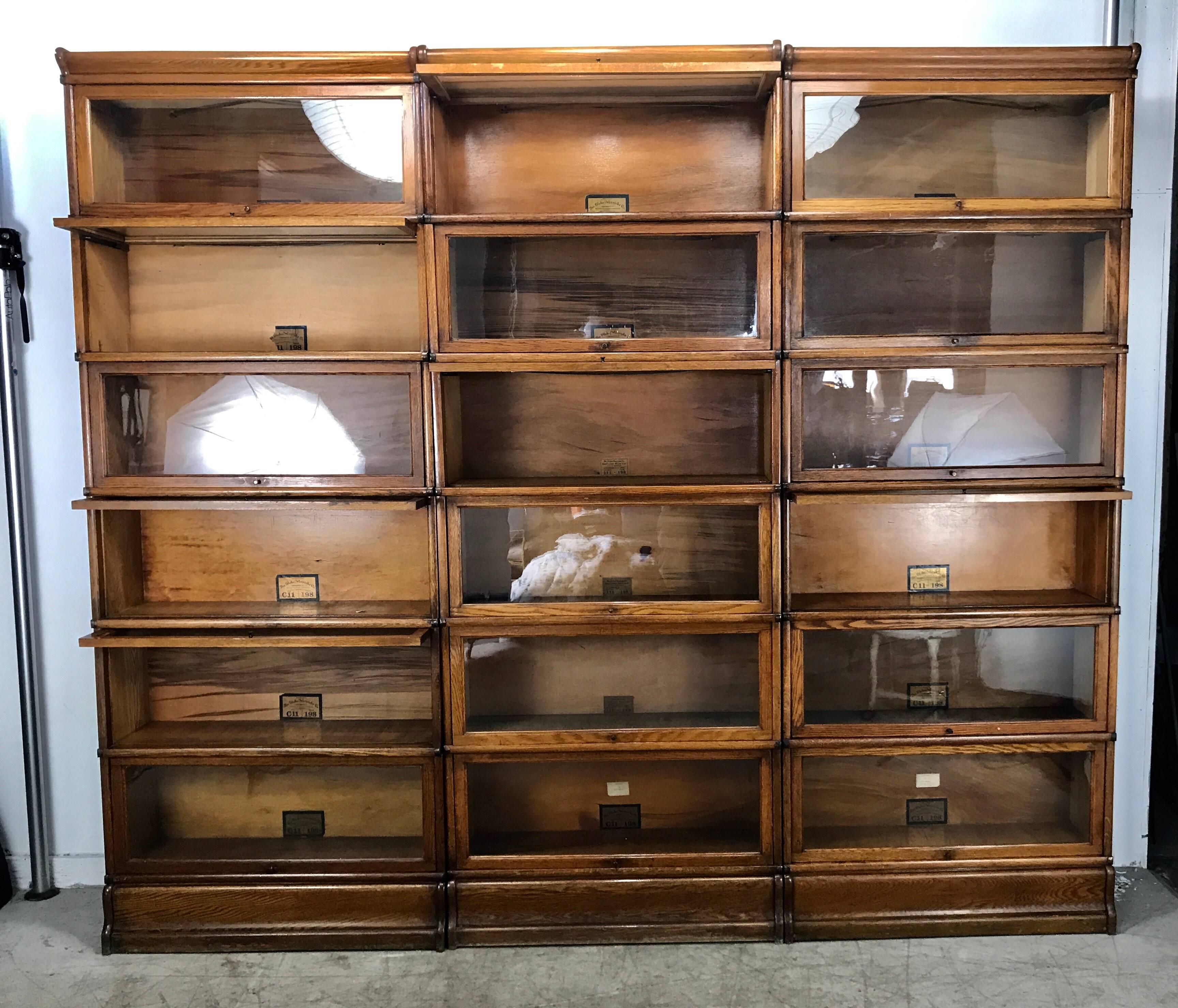 Monumental globe Wernicke oak bookcase, 18 pieces. Amazing lineup of globe Wernicke bookcase. Purchased recently out of prominent Judges office, Downtown Buffalo New York, solid oak all in perfect condition. Surface and patina .Have lived together