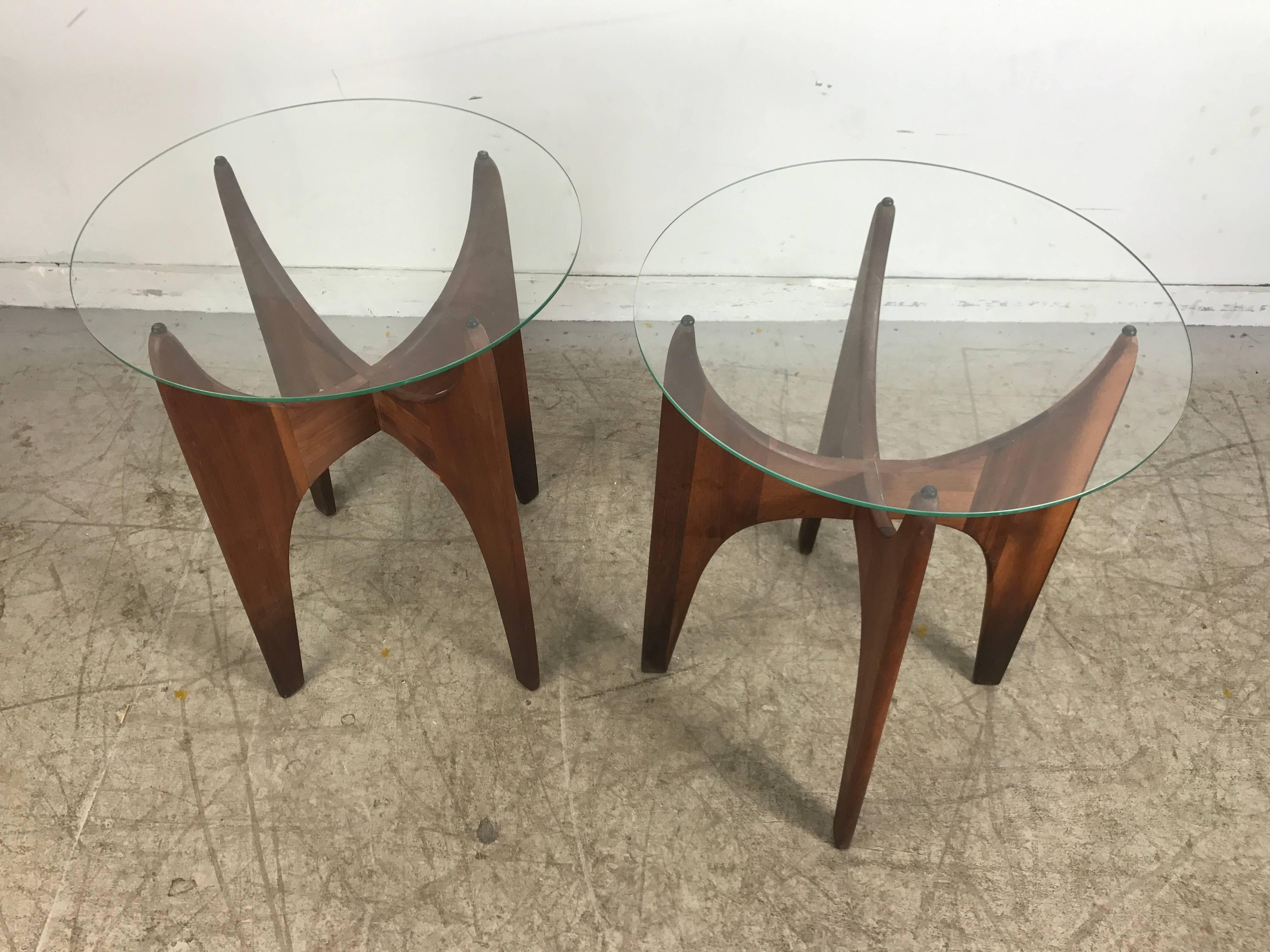 Classic Mid-Century Modern, seldom seen pair of tall jax end or lamp tables designed by Adrian Pearsall. Beautiful sculpted walnut bases, glass tops.