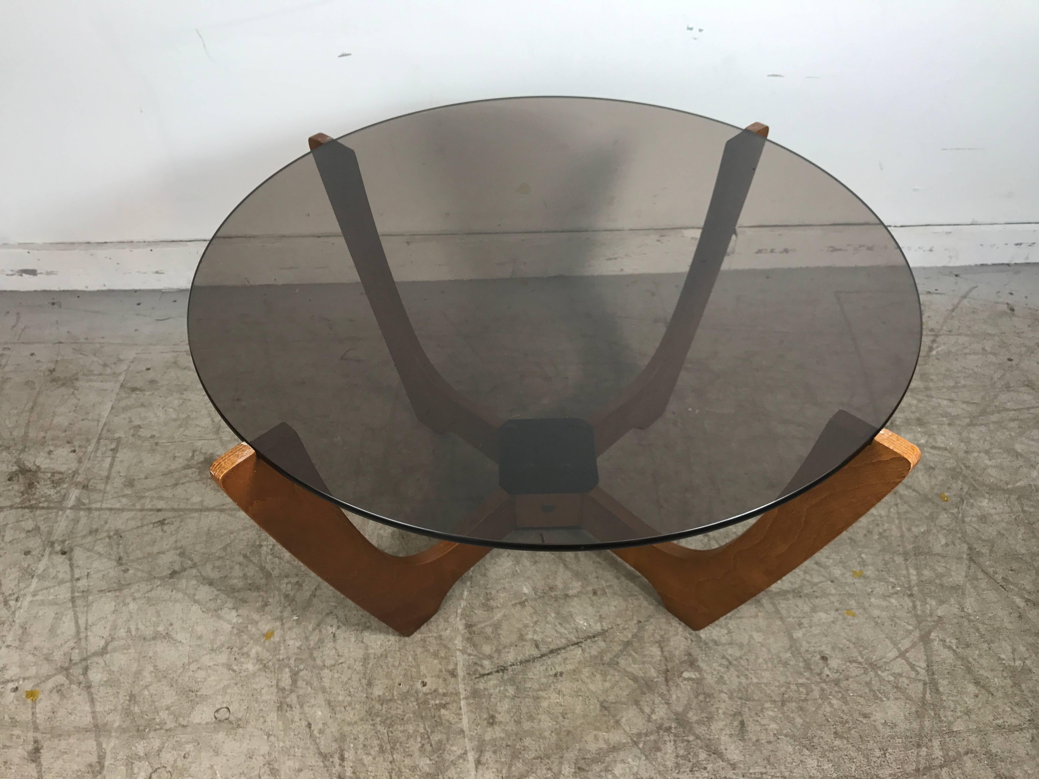 Classic Scandinavian “Luna” cocktail table by Odd Knutsen, Norway. Early seldom seen cocktail/coffee table designed by Odd Knutsen, wonderful original condition, original smoked glass top. See other listing for matching pair of Luna lounge chairs.