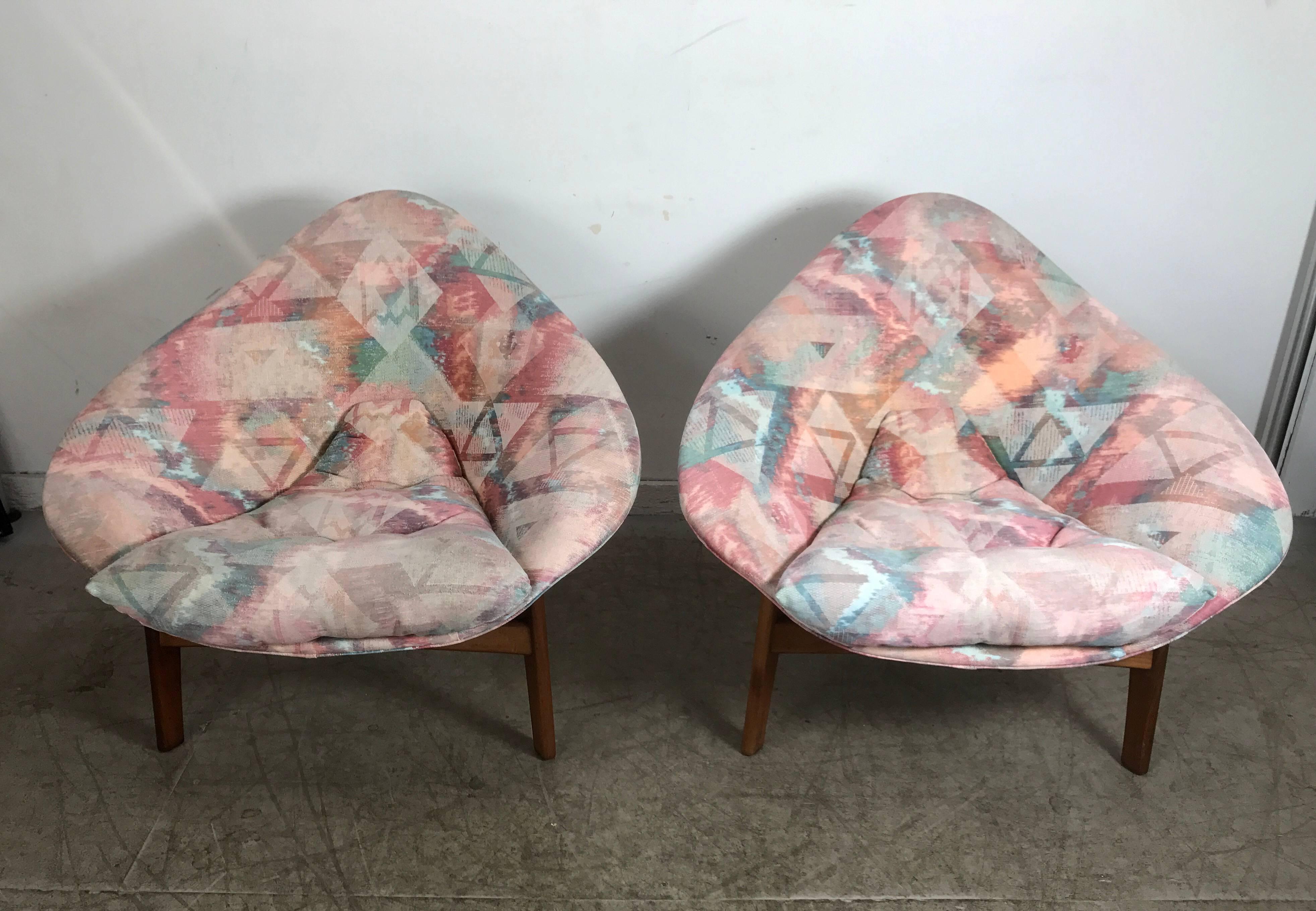 Unusual pair of Mid-Century Modern sculptural walnut lounge chairs by Adrian Pearsall .Beautiful three-leg sculpted walnut base, diamond wedge molded top, reupholstered in what appears to be the 1980s, in nice usable condition, extremely