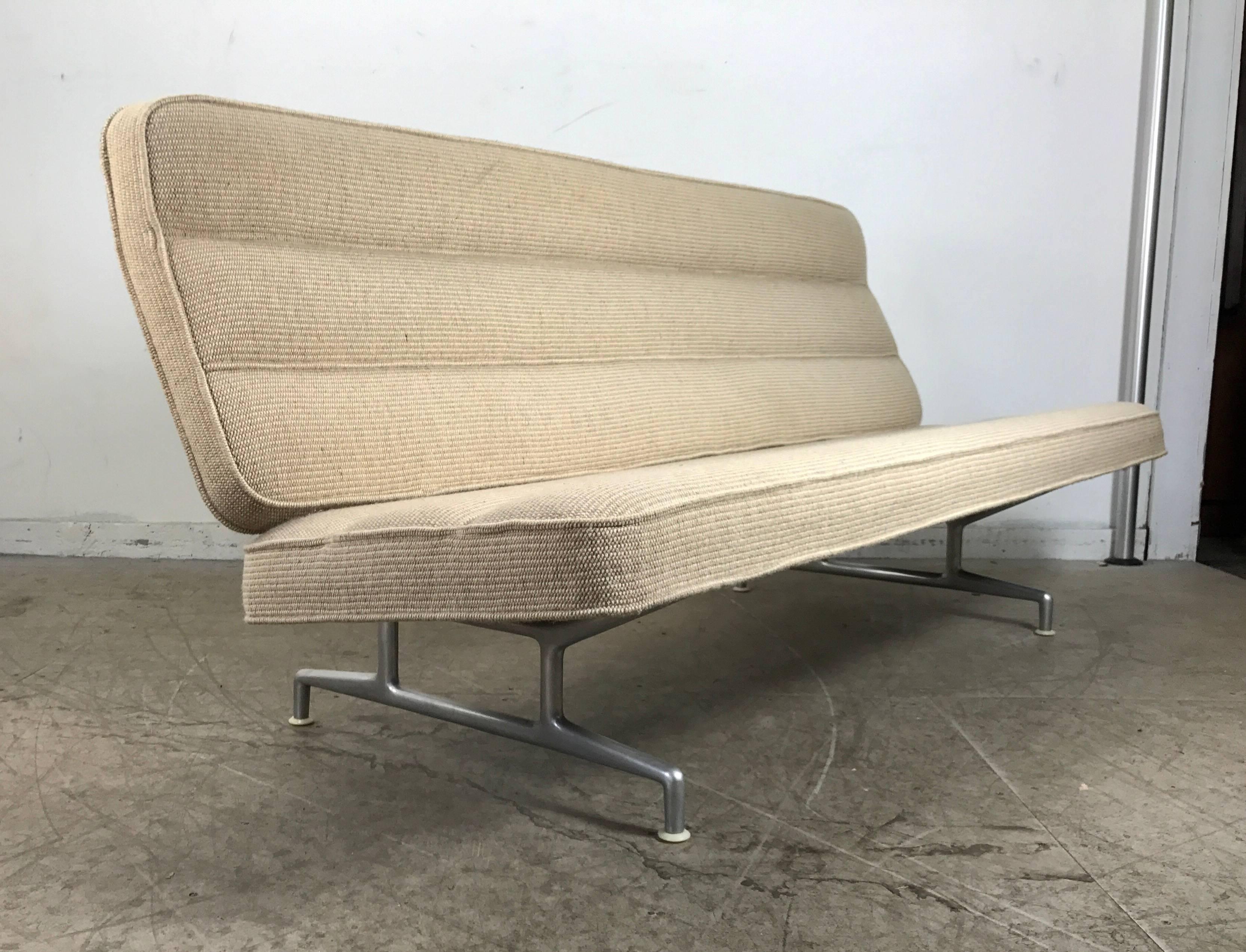 Rare 3473 sofa by Charles Eames. Retains original oatmeal color wool fabric, showroom condition! No sag, puckering etc. Cast aluminium frame, Channeled back and seat. Produced only from 1964-1973. Made by Herman Miller. Stylish and extremely