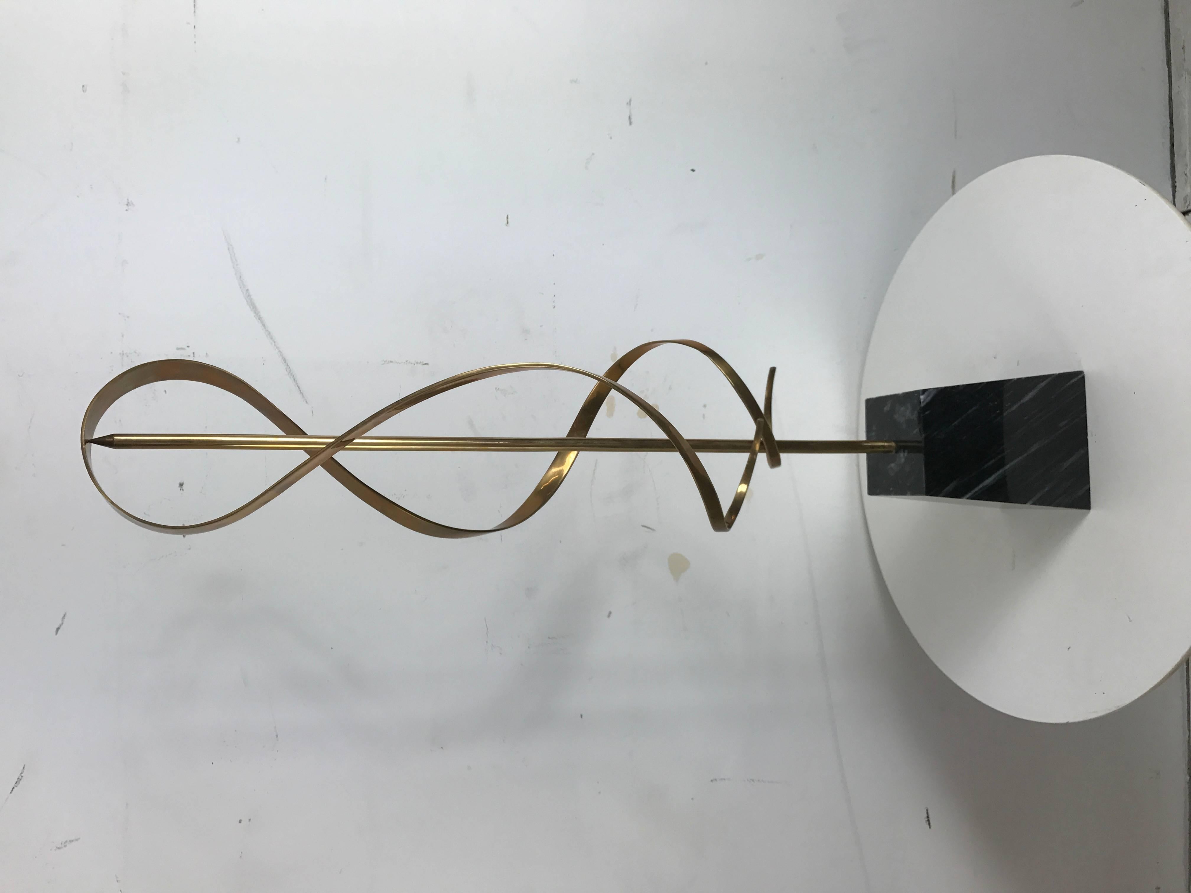 Brass and marble Kinetic sculpture, USA, 1970s by American jewelry designer and sculpture Russell Secrest, 1935-2010.