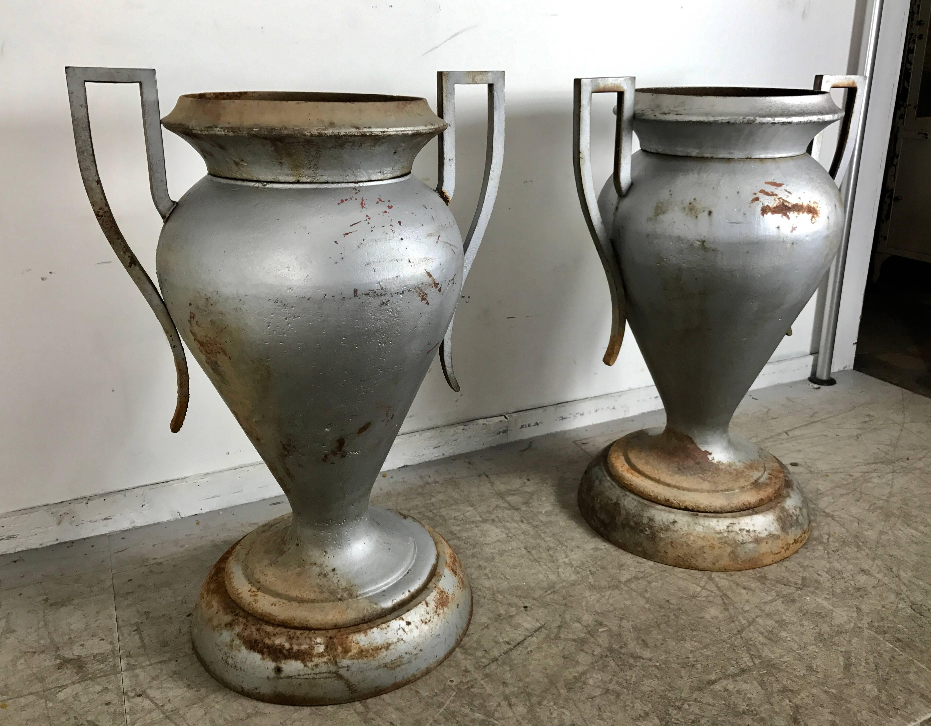 Beautiful original matched pair large Art Deco urn manufactured by Kramer Bros. All original three-piece, retain original paint, surface, super stylish, sleek simple Art Deco design. Measure 40