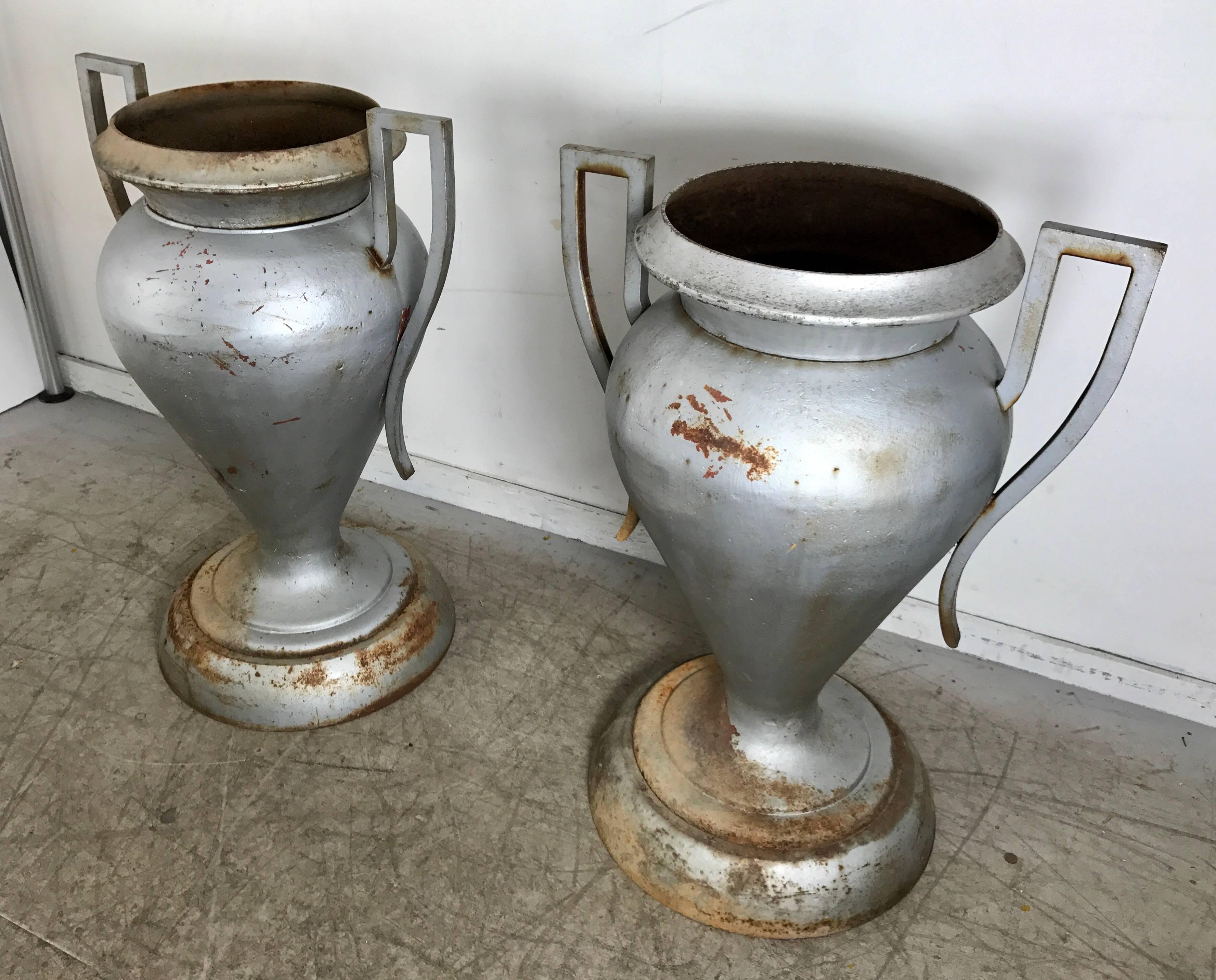 Early 20th Century Matched Pair of Large American Art Deco Cast Iron Urns by Kramer Bros