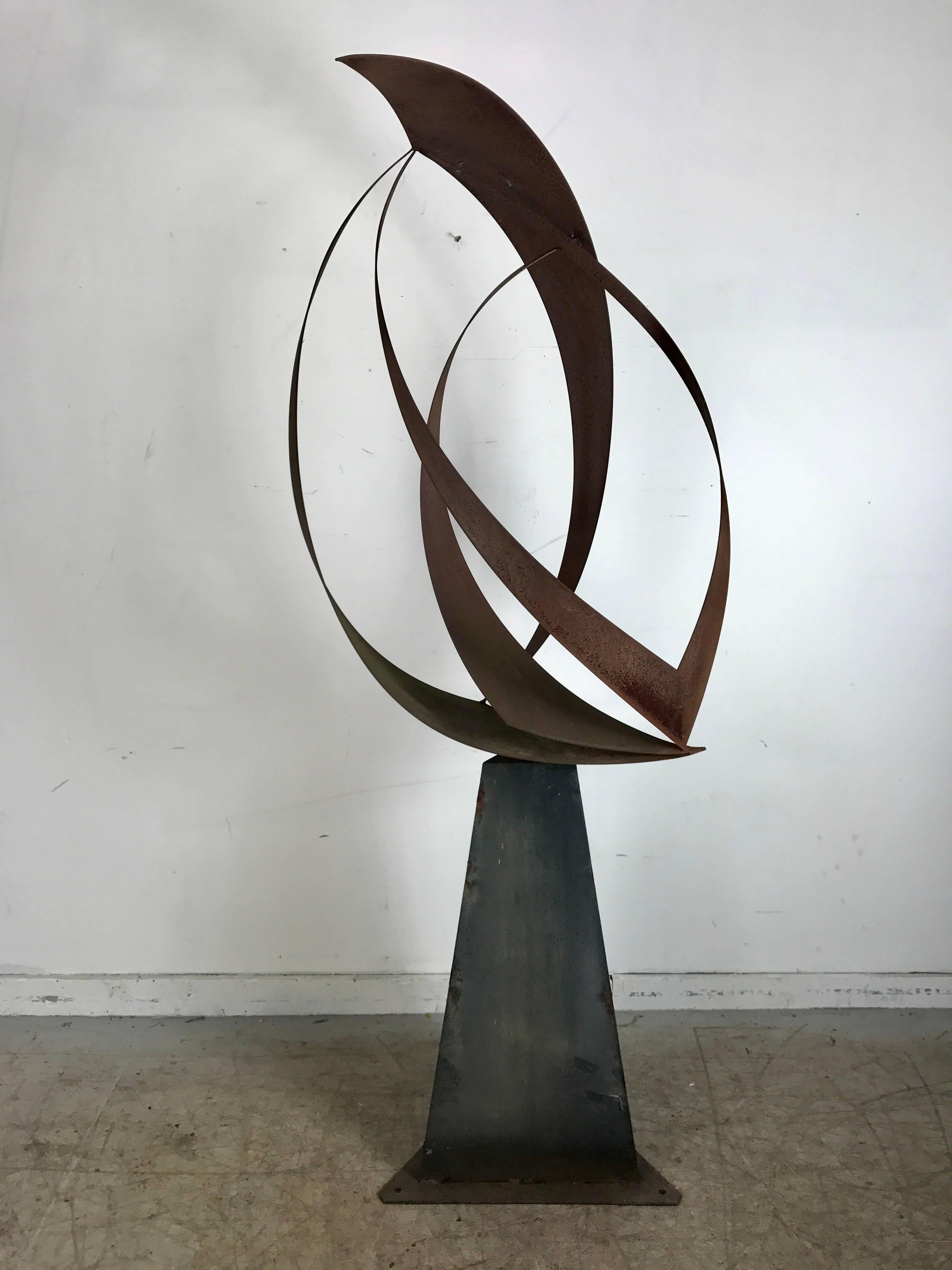 Large 6' metal abstract modernist sculpture by Bill Heise, rotates 360 degrees, hand executed, stunning exterior or interior, hand delivery avail to New York City or anywhere en route from Buffalo NY

The pieces are crafted from