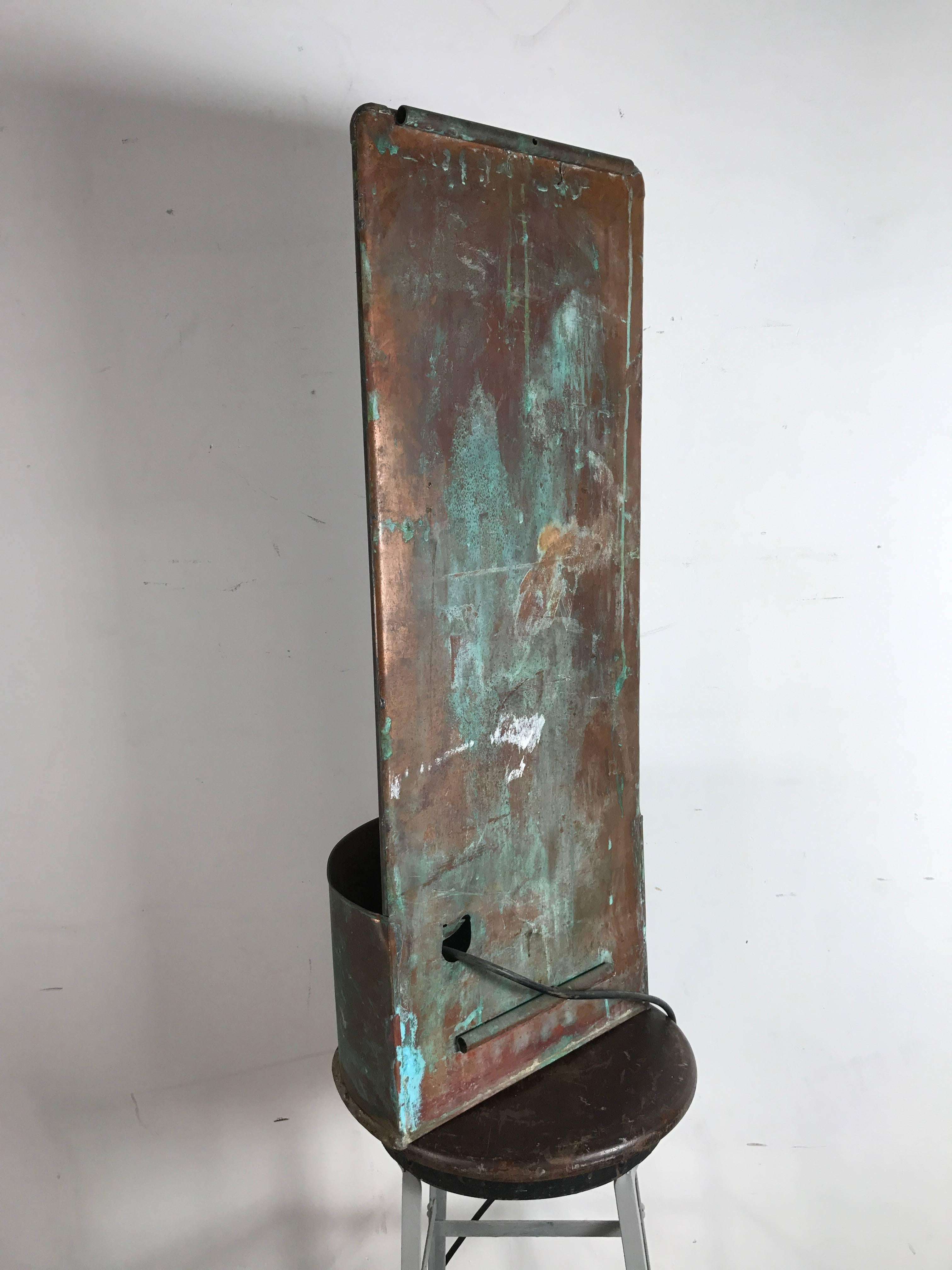 Modernist hanging copper water fountain, sculpture. Hand exicuted, water cascades down the six-tiered copper petals, indoor or outdoor, amazing form and patina.