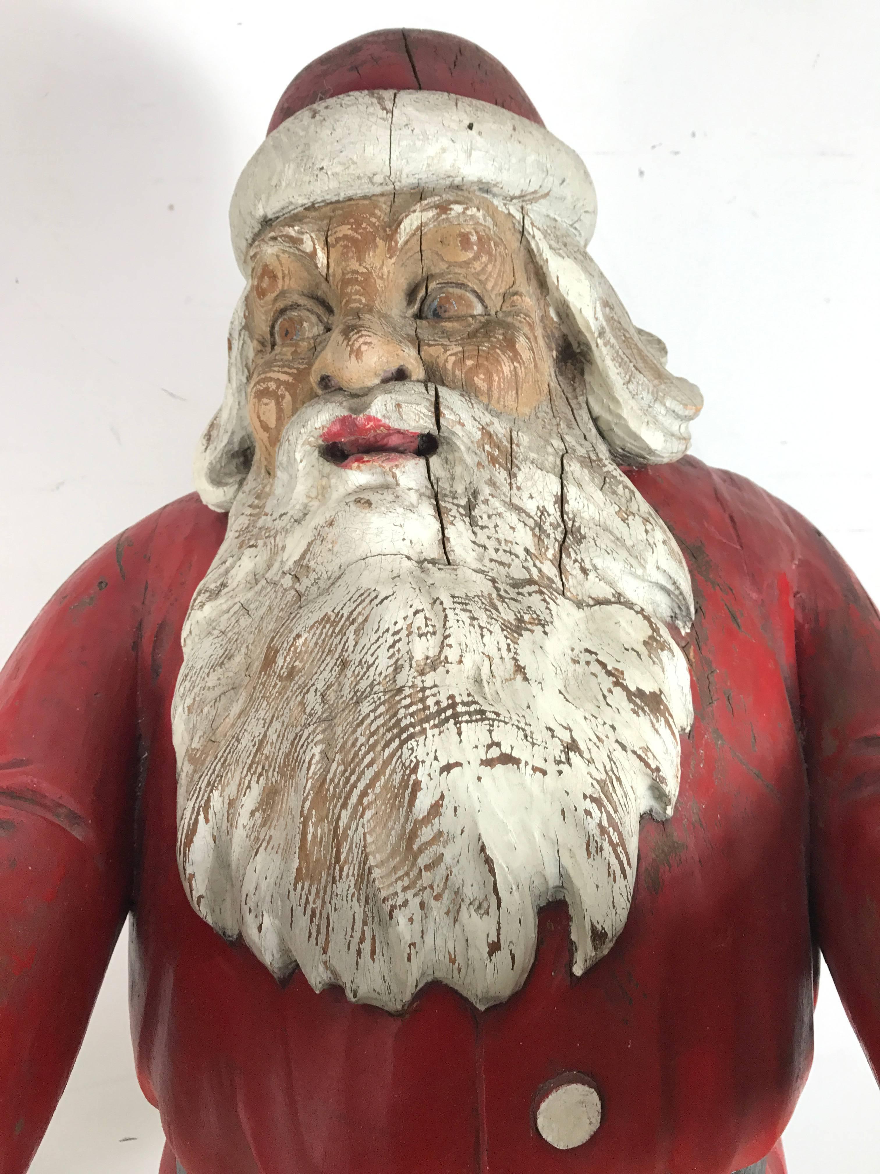 Turn of the Century Life Size Carved Wood and Painted Folk Art Santa Sculpture In Distressed Condition In Buffalo, NY