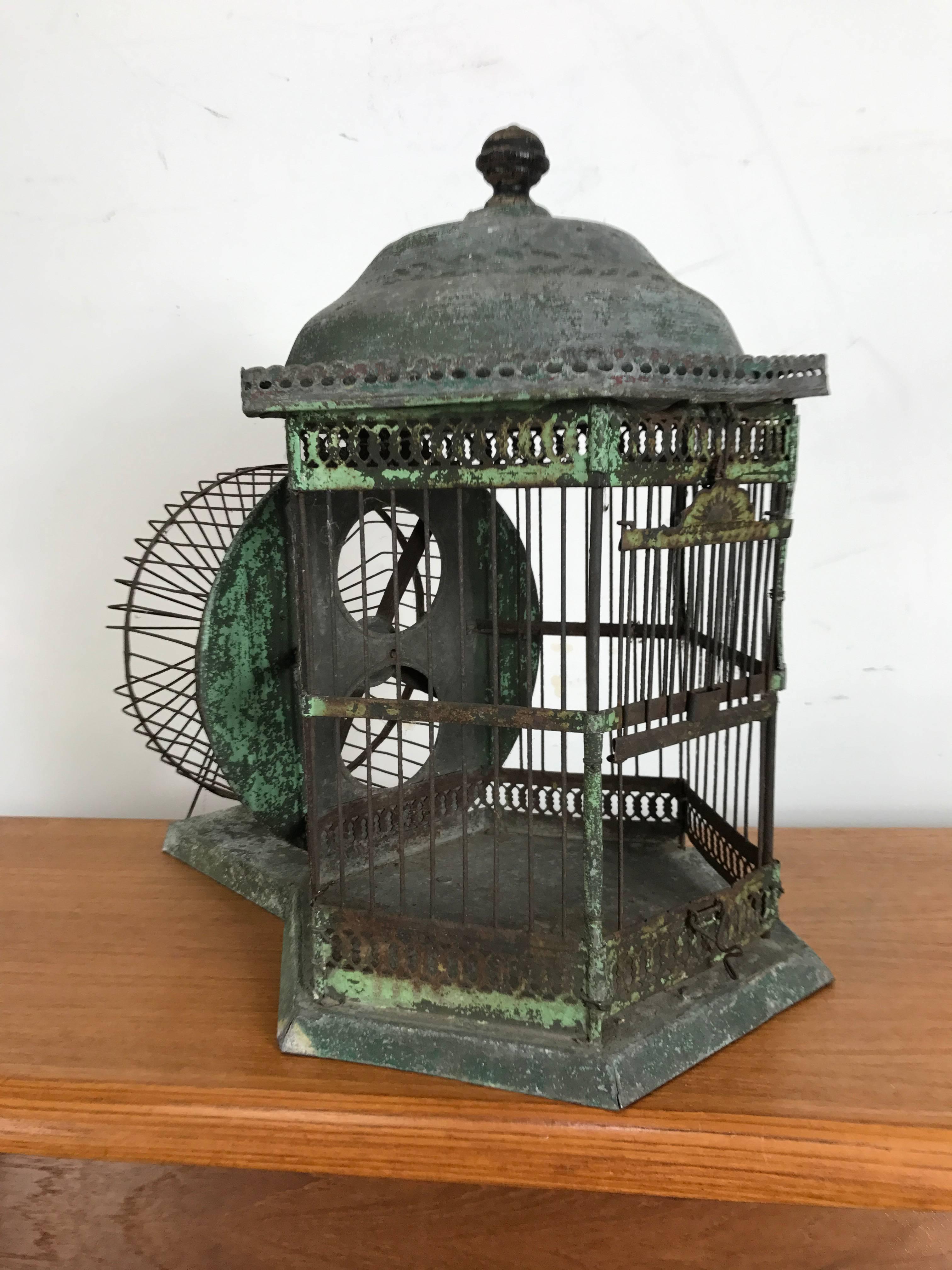 Antique architectural hamster cage, turn of the century hand executed. Amazing patina and surface wheel spins perfectly.